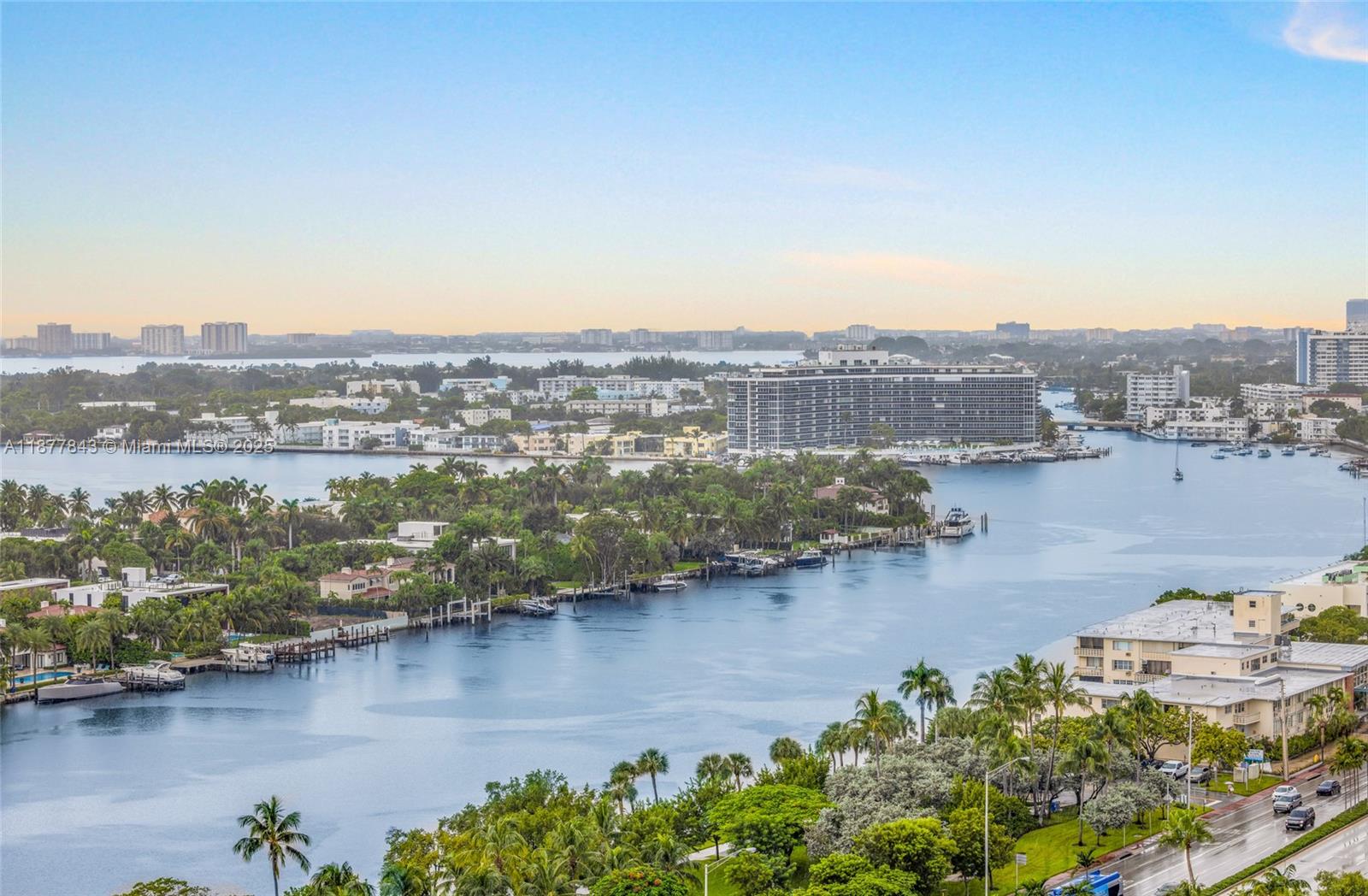 6301 Collins Avenue, Unit 2107 Miami Beach, FL 33141 - Photo 32 of 42 a view of a lake with tall buildings