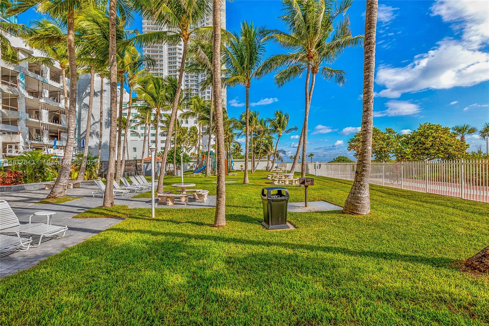 6301 Collins Avenue, Unit 2107 Miami Beach, FL 33141 - Photo 34 of 42 a view of a park with large trees