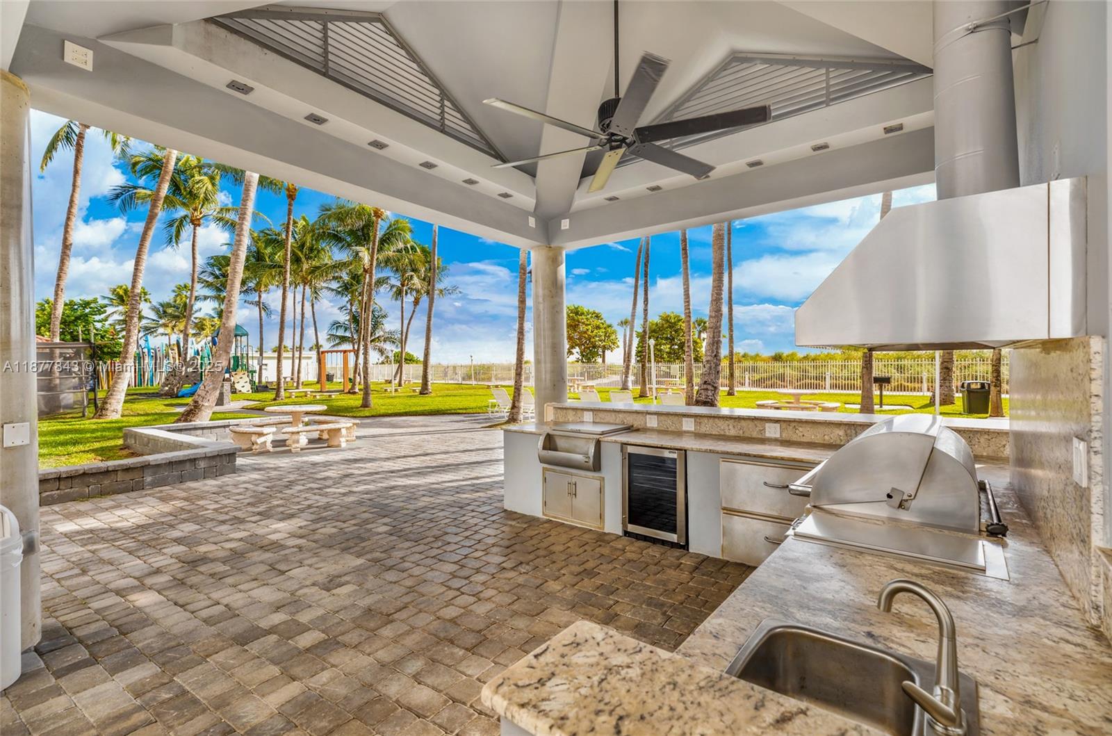 6301 Collins Avenue, Unit 2107 Miami Beach, FL 33141 - Photo 35 of 42 a view of a swimming pool with a patio