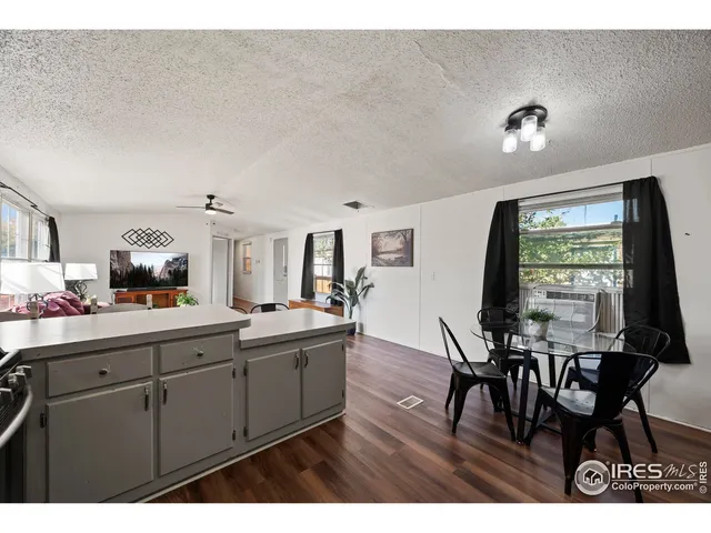 a view of dining room and wooden floor