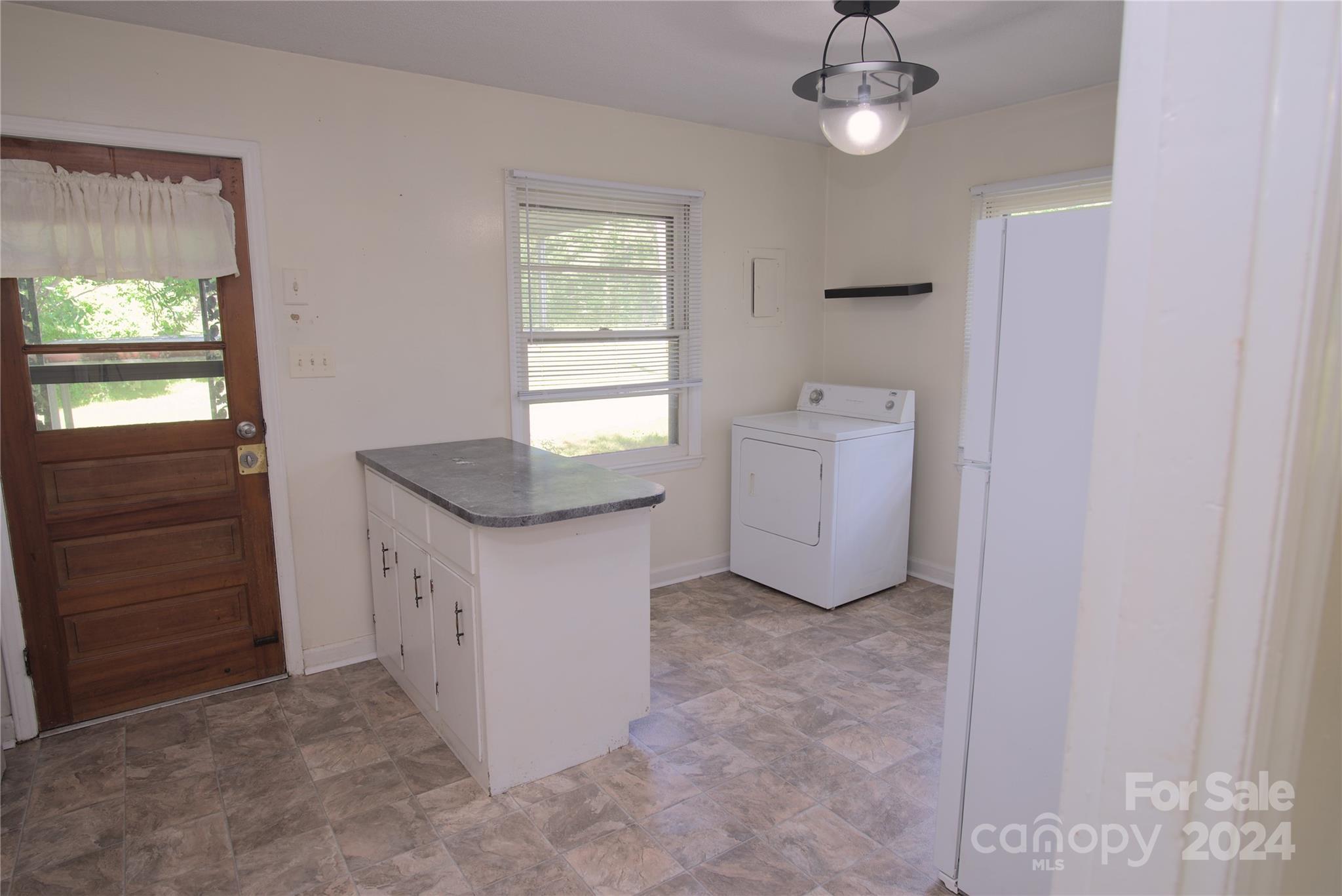 14903 Beatties Ford Road Huntersville, NC 28078 - Photo 12 of 25 a view of an empty room with a window