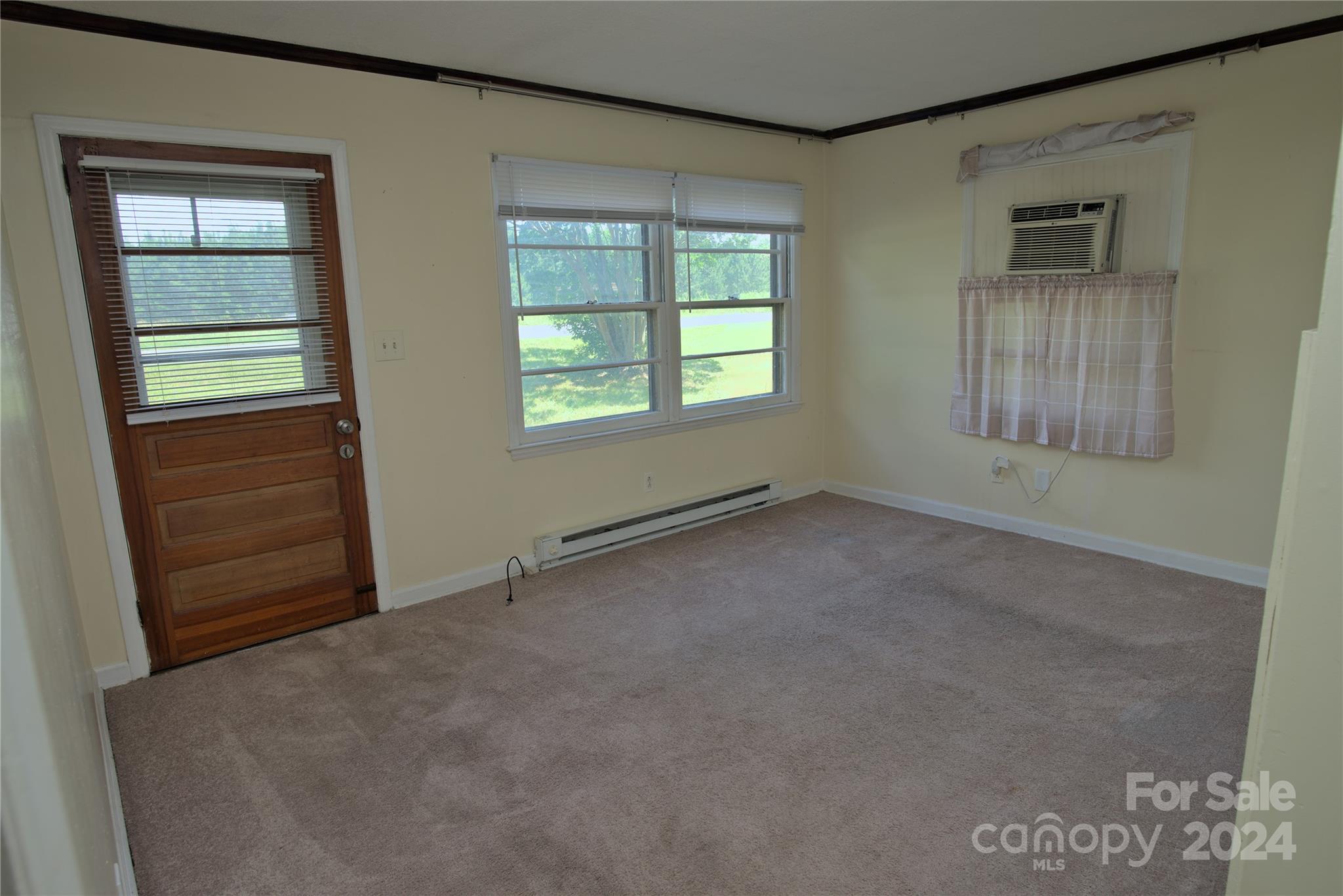 14903 Beatties Ford Road Huntersville, NC 28078 - Photo 14 of 25 an empty room with windows