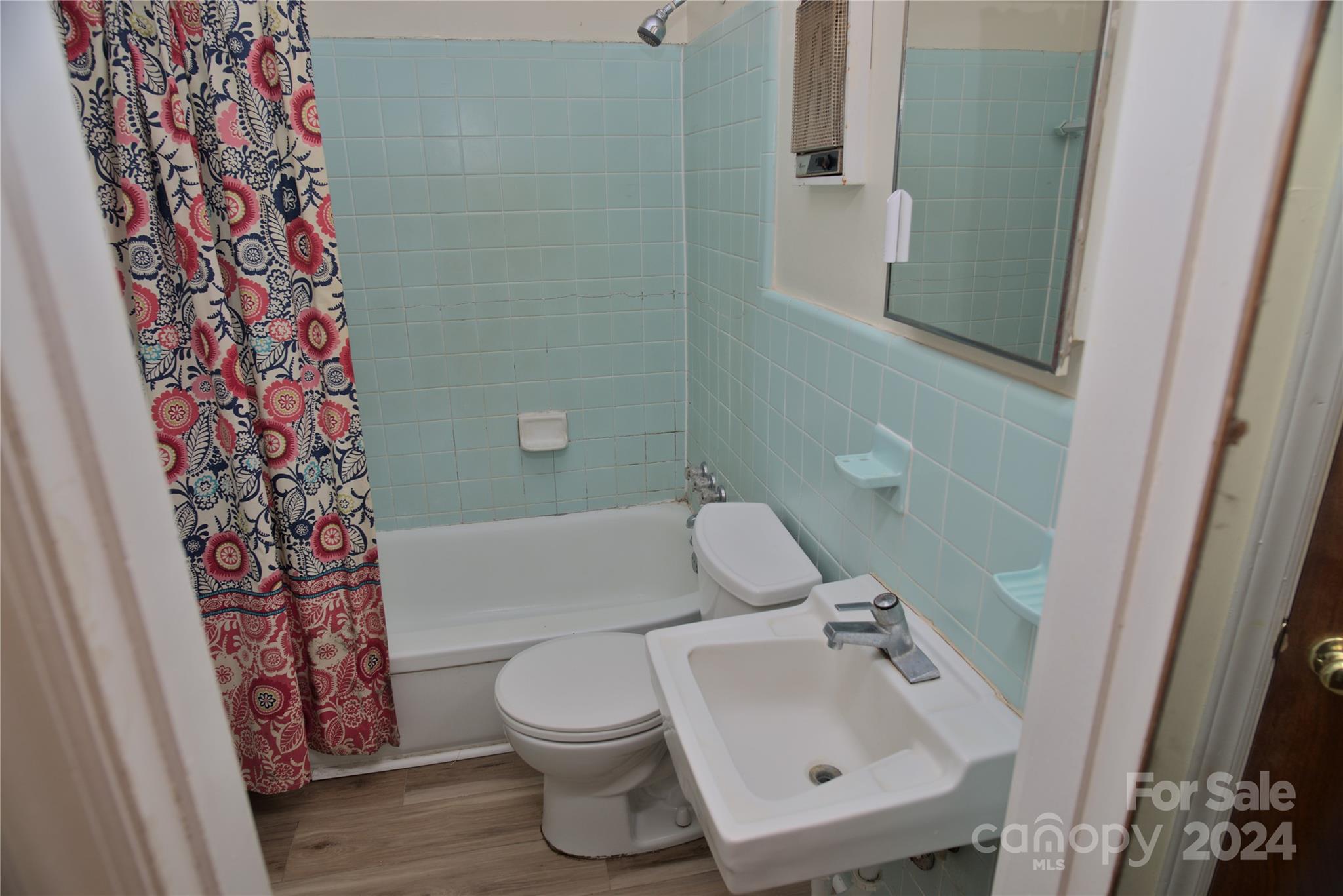 14903 Beatties Ford Road Huntersville, NC 28078 - Photo 18 of 25 a bathroom with a sink toilet and shower