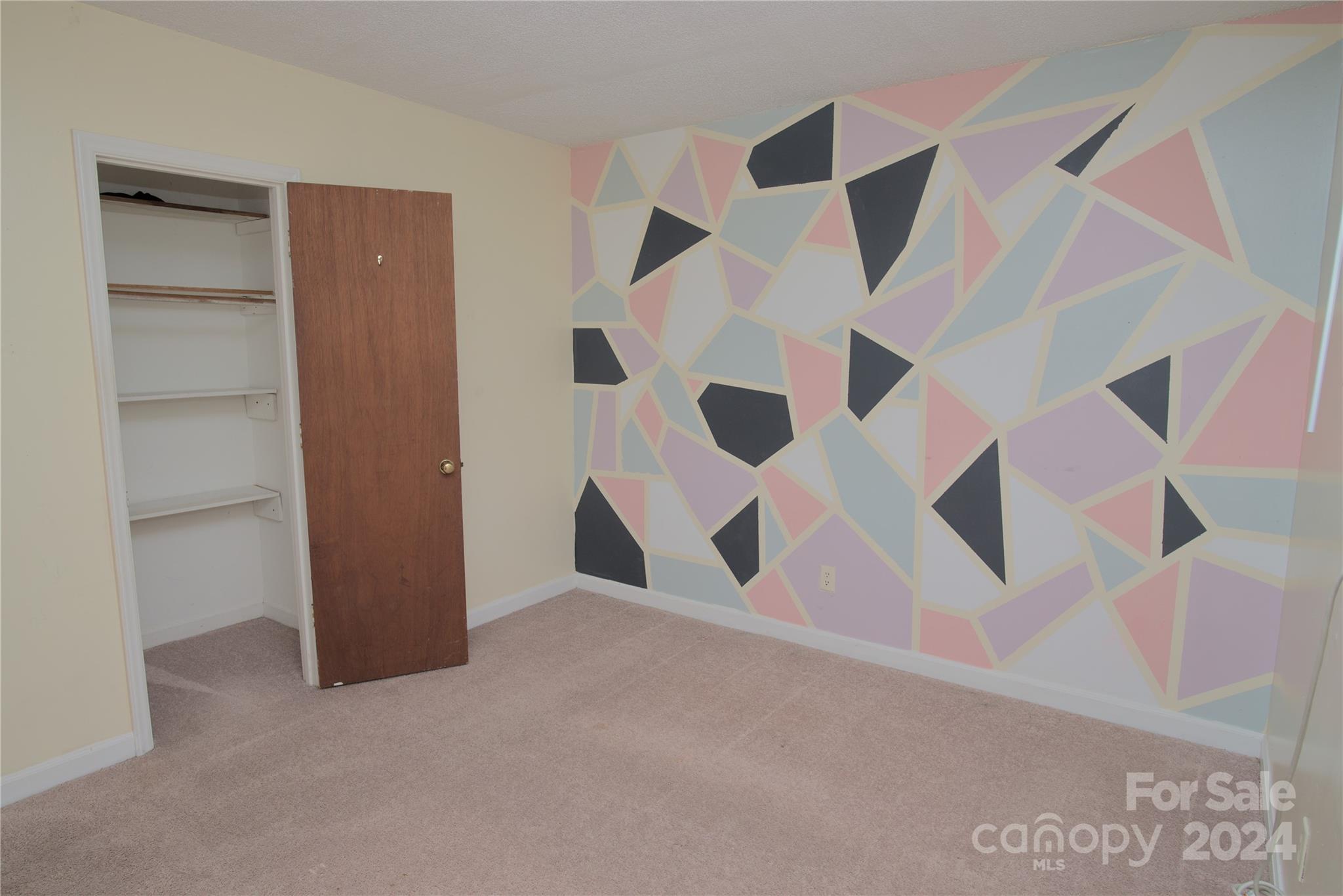 14903 Beatties Ford Road Huntersville, NC 28078 - Photo 20 of 25 a view of a livingroom with a ceiling fan and entryway