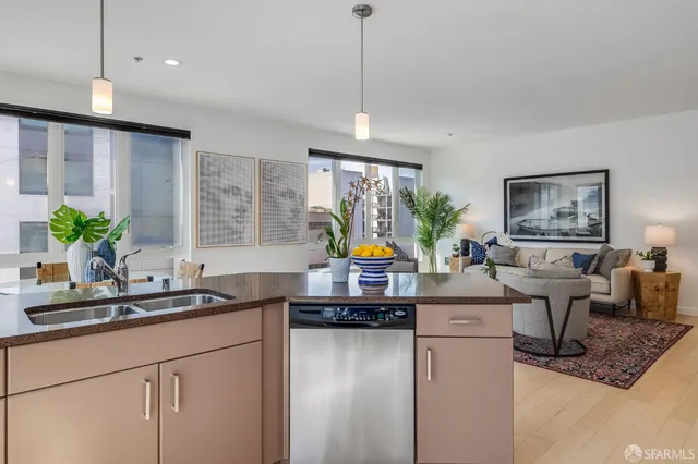 a bed room with a bed and a lamp on table