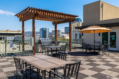 a view of a tall building with a palm tree