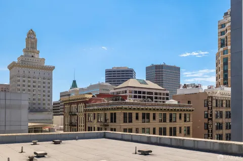 a view of multiple houses with a street