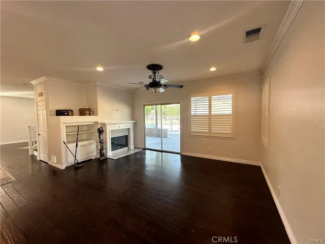 a view of a kitchen with a dishwasher cabinets and a wooden floor