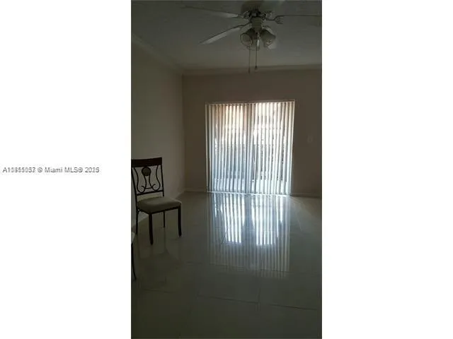 a picture of a room with a window