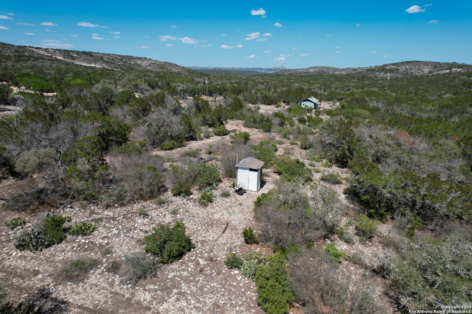 0 Rm 334 Brackettville, TX 78832 - Photo 12 of 15 a view of a city with mountains in the background
