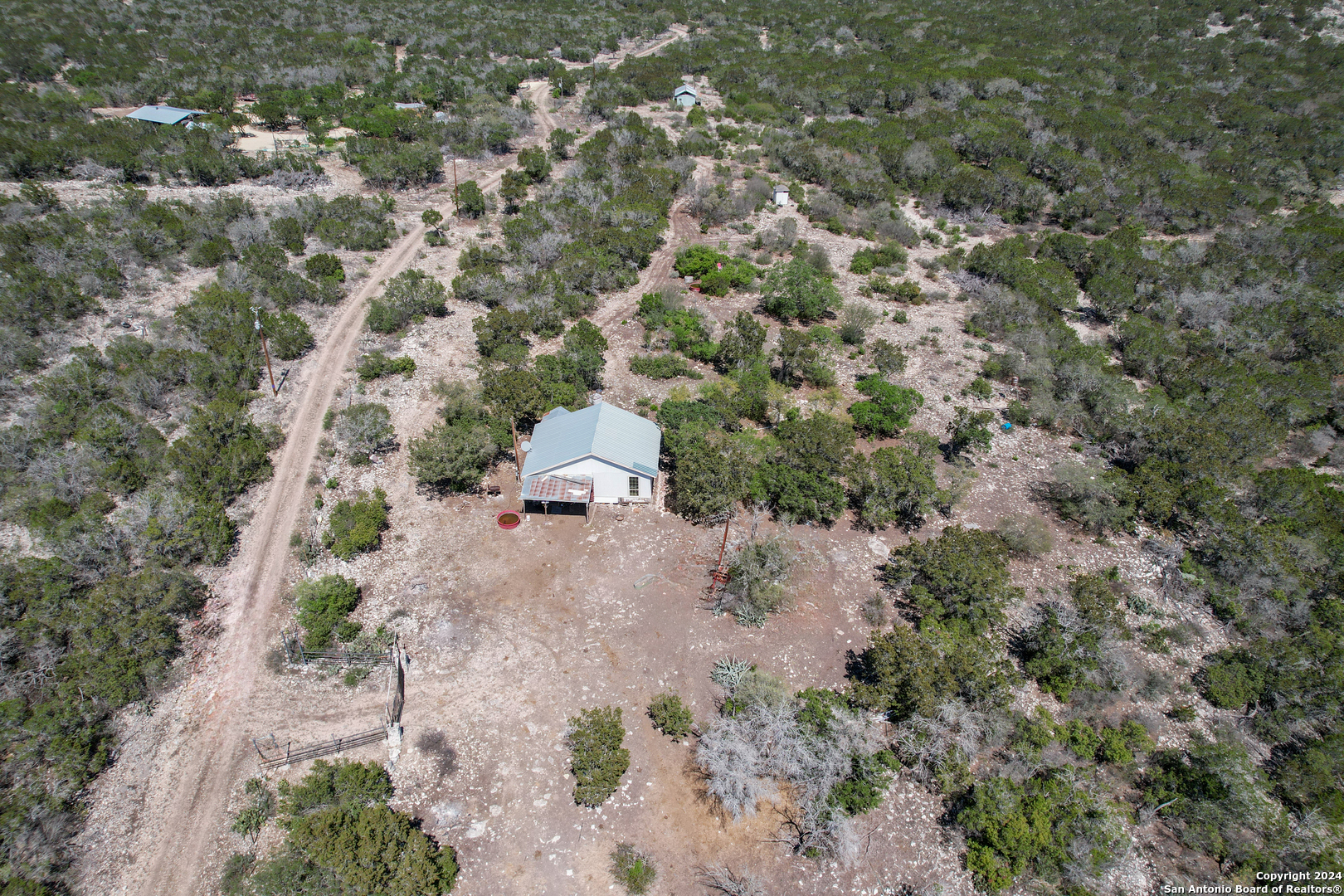 0 Rm 334 Brackettville, TX 78832 - Photo 5 of 15 an aerial view of a house with a yard