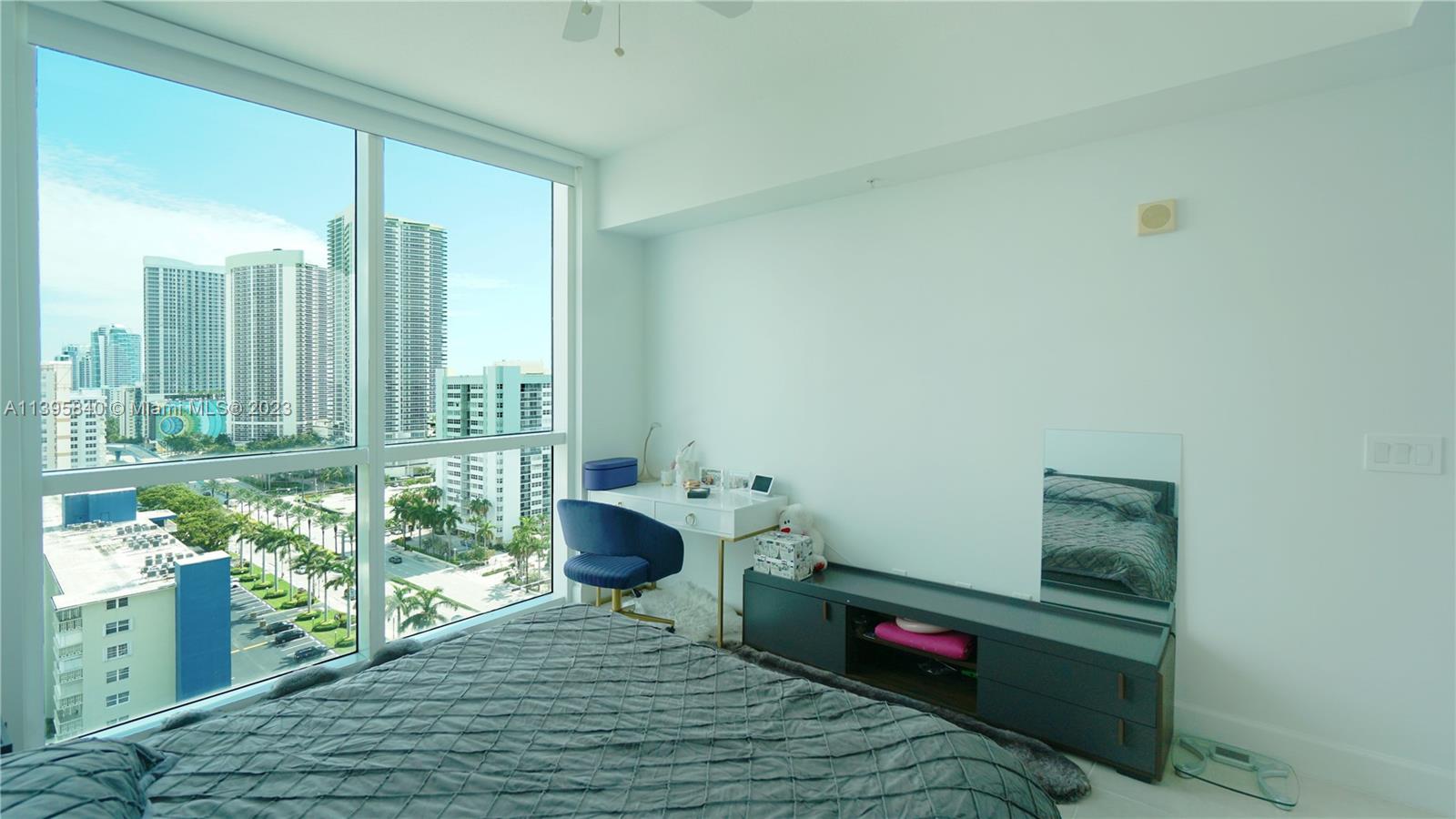 Ocean Marine Yacht Club Hallandale Beach, FL 33009 - Photo 12 of 31 a bedroom with a bed and a window