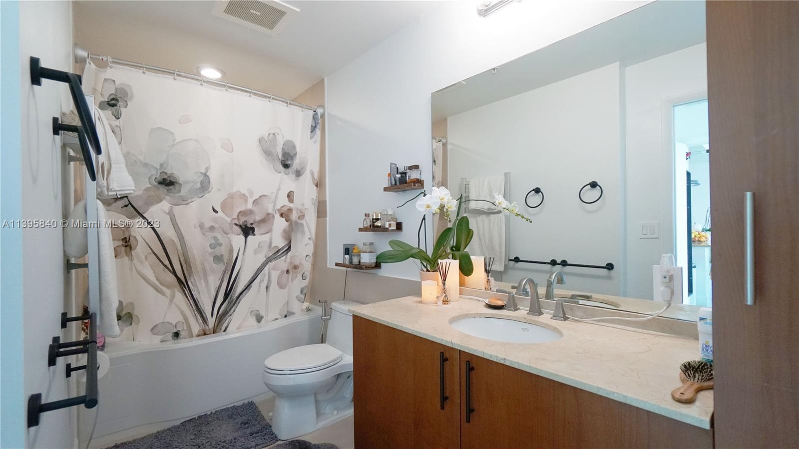 Ocean Marine Yacht Club Hallandale Beach, FL 33009 - Photo 13 of 31 a bathroom with a sink toilet and shower