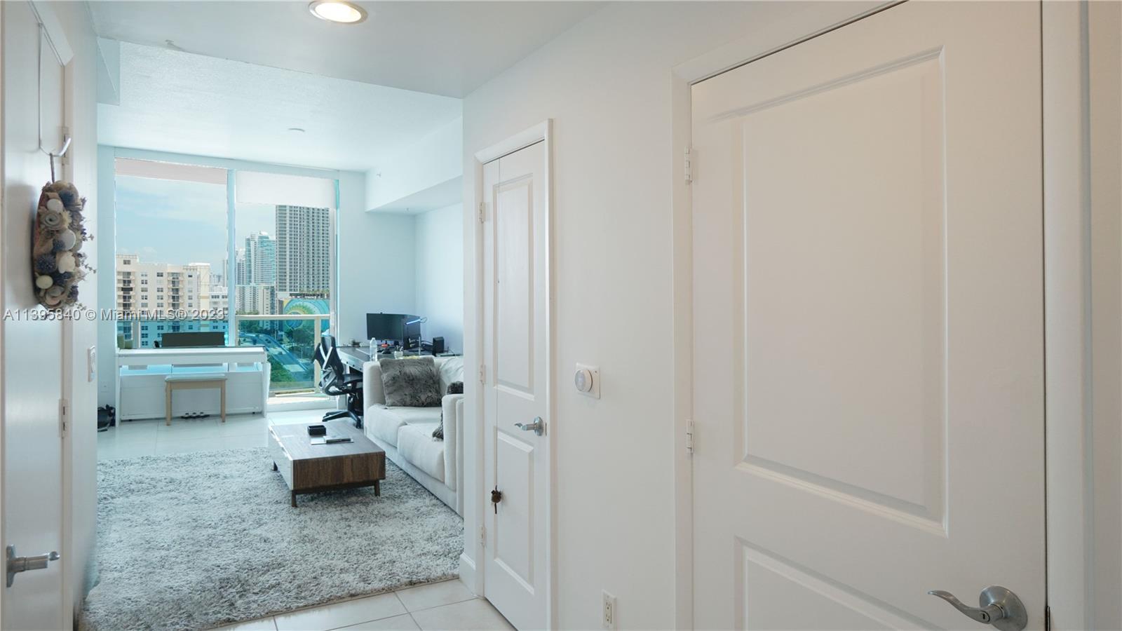 Ocean Marine Yacht Club Hallandale Beach, FL 33009 - Photo 3 of 31 a living room with furniture and a view of bathroom