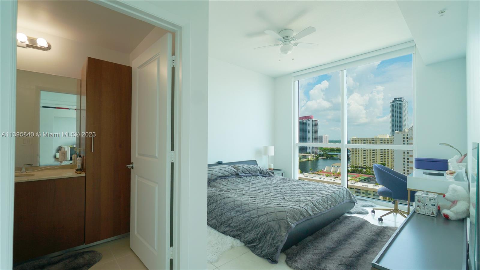 Ocean Marine Yacht Club Hallandale Beach, FL 33009 - Photo 9 of 31 a living room with furniture and a large window