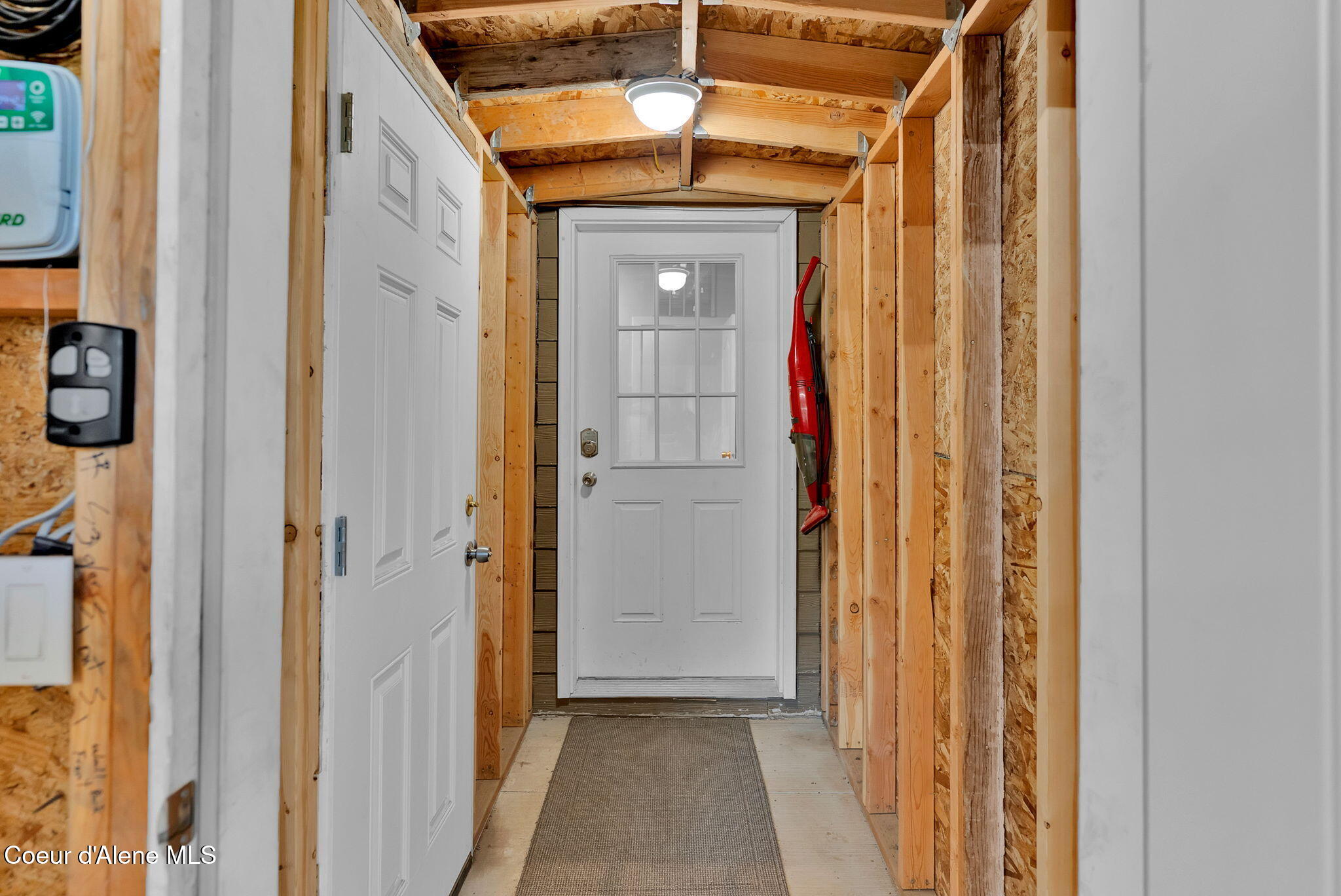 241 Promised Ridge Priest River, ID 83856 - Photo 34 of 58 Alleyway from Shop to House