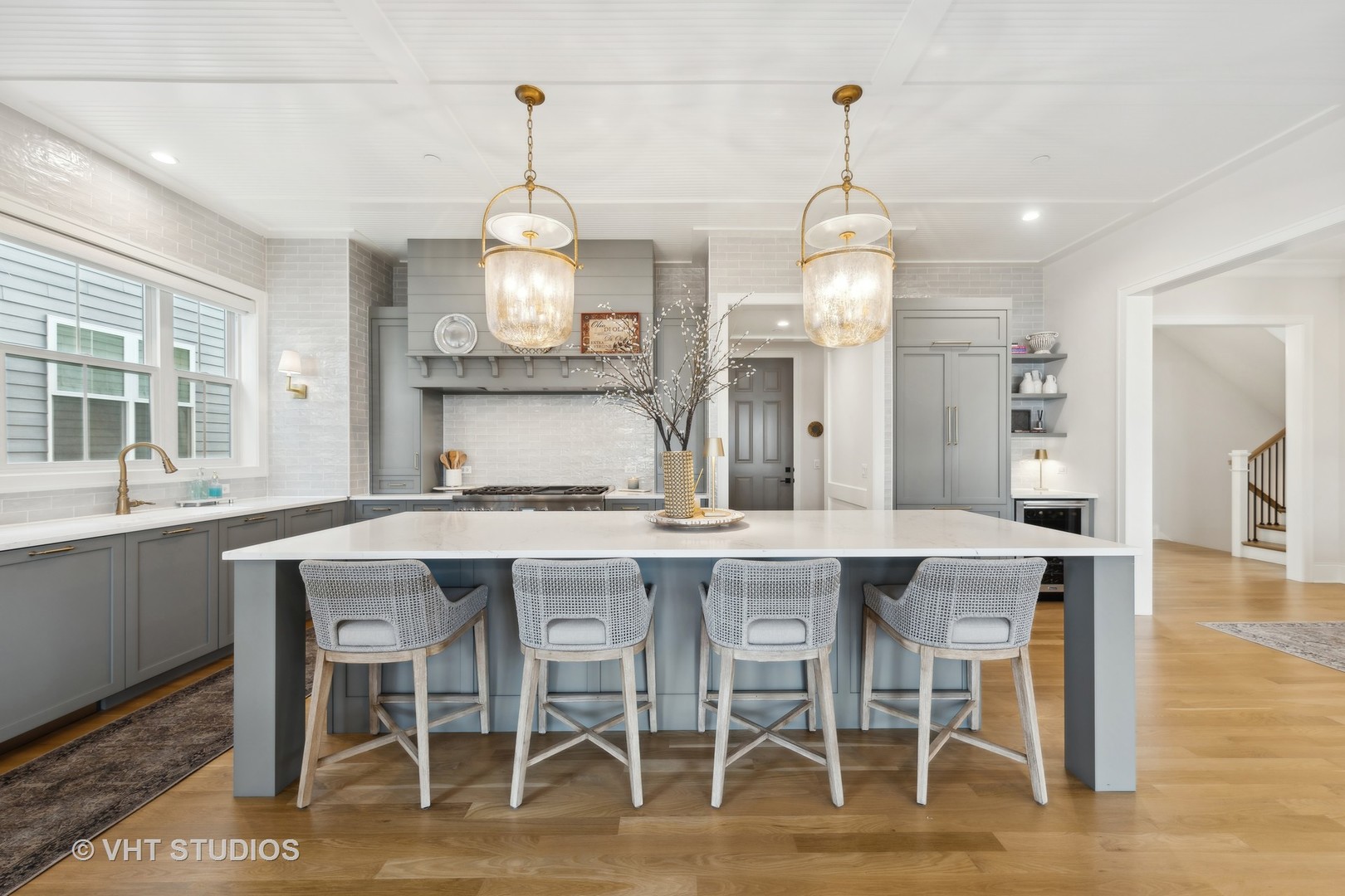 1110 Hickory Drive Western Springs, IL 60558 - Photo 19 of 55 a kitchen with stainless steel appliances a dining table chairs and wooden floor