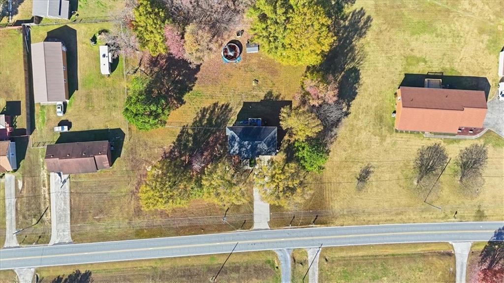 941 Grassdale Road Northwest Cartersville, GA 30121 - Photo 32 of 42 front view of a house with a yard