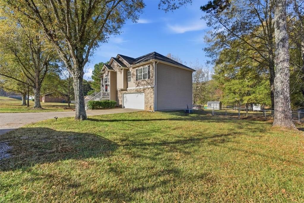 941 Grassdale Road Northwest Cartersville, GA 30121 - Photo 41 of 42 a house view with garden space