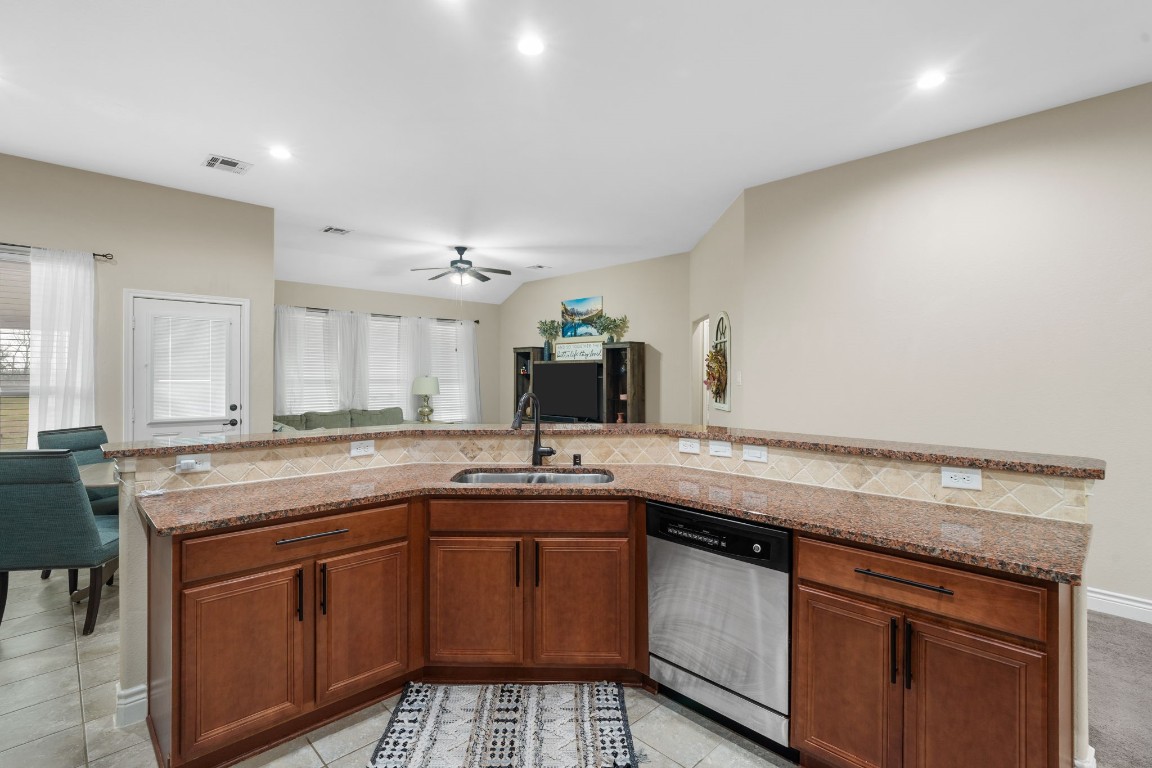 4926 Magnolia Bend Drive Rosharon, TX 77583 - Photo 13 of 27 a kitchen with a sink and cabinets