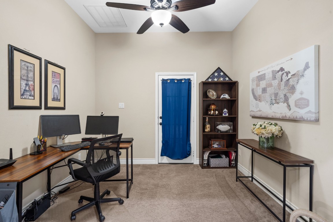 4926 Magnolia Bend Drive Rosharon, TX 77583 - Photo 5 of 27 a view of a workspace with furniture and a window