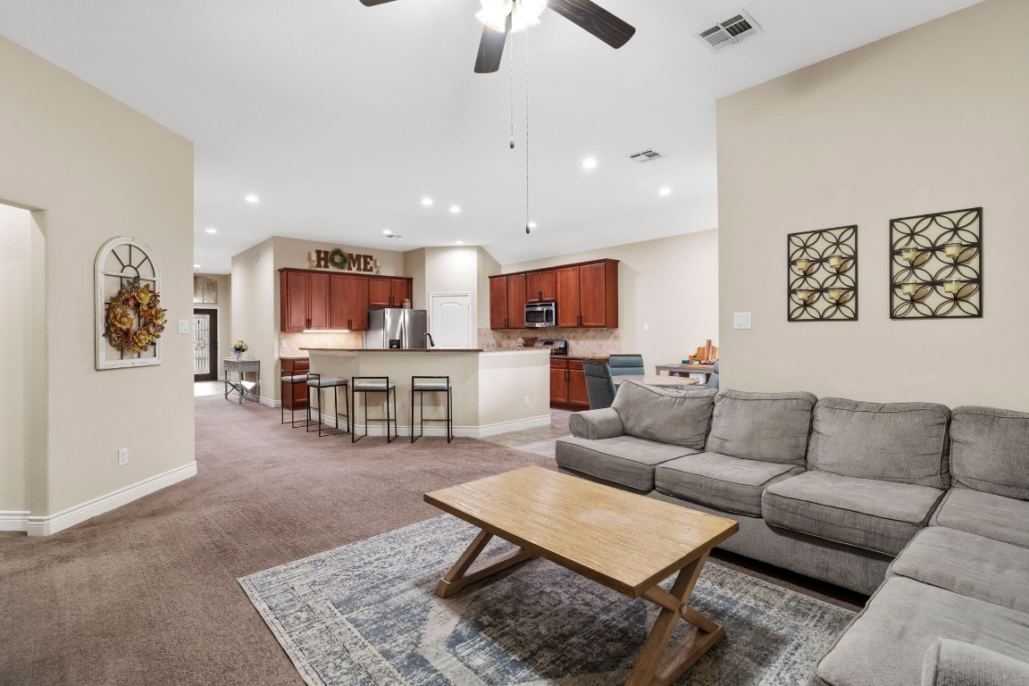 4926 Magnolia Bend Drive Rosharon, TX 77583 - Photo 7 of 27 a living room with furniture and kitchen view