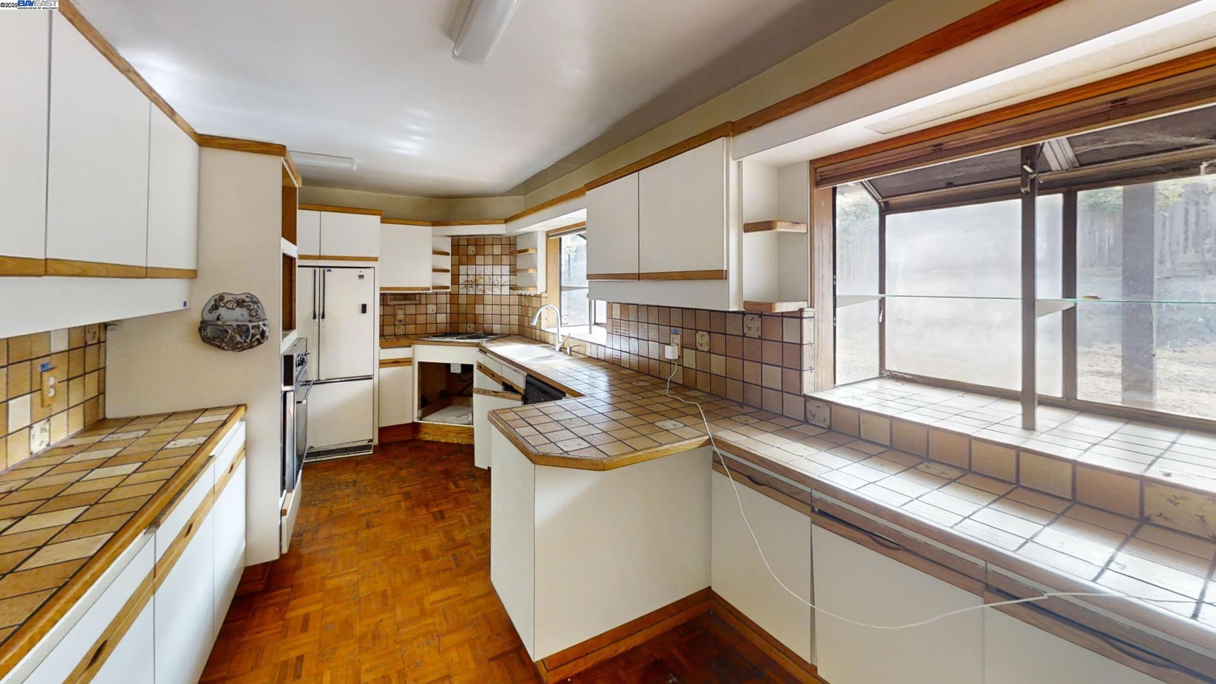 1770 Pleasant Hill Road Pleasant Hill, CA 94523 - Photo 9 of 17 a kitchen with stainless steel appliances granite countertop sink stove and cabinets