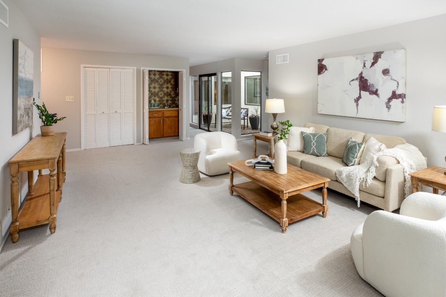 22415 Rancho Deep Cliff Drive Cupertino, CA 95014 - Photo 11 of 33 a living room with furniture and a large window