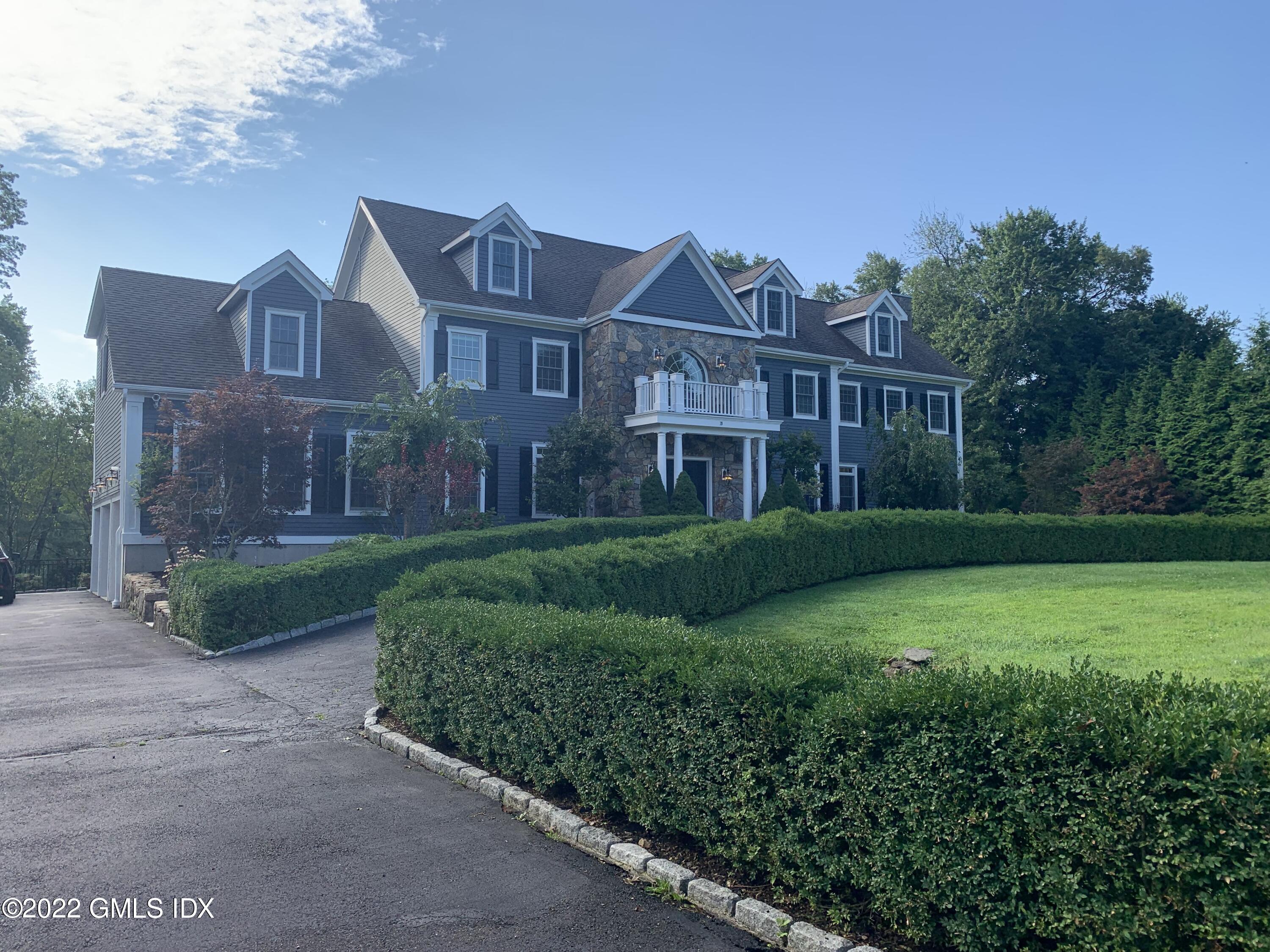 19 West Hill Road Stamford, CT 06902 - Photo 1 of 25 a view of a front of house with a yard
