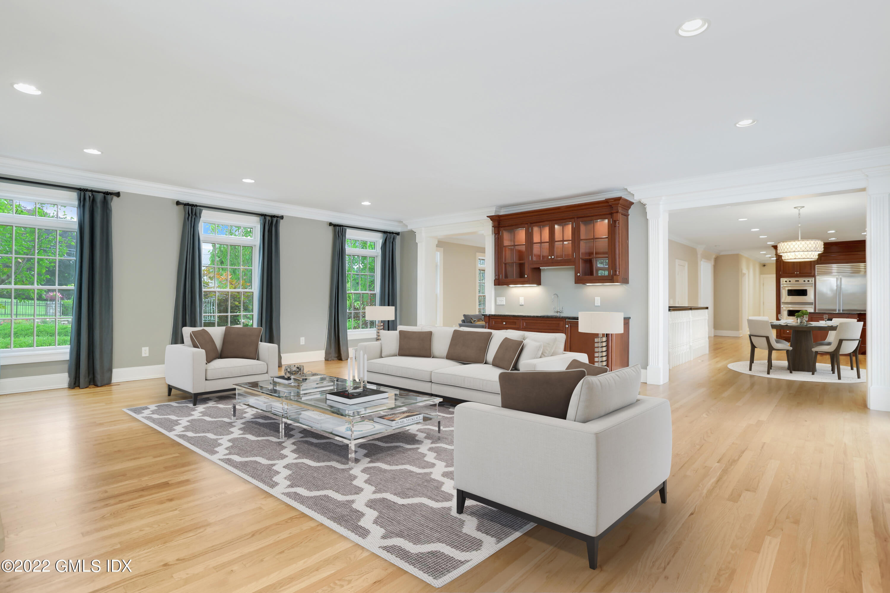 19 West Hill Road Stamford, CT 06902 - Photo 11 of 25 a living room with furniture and a large window