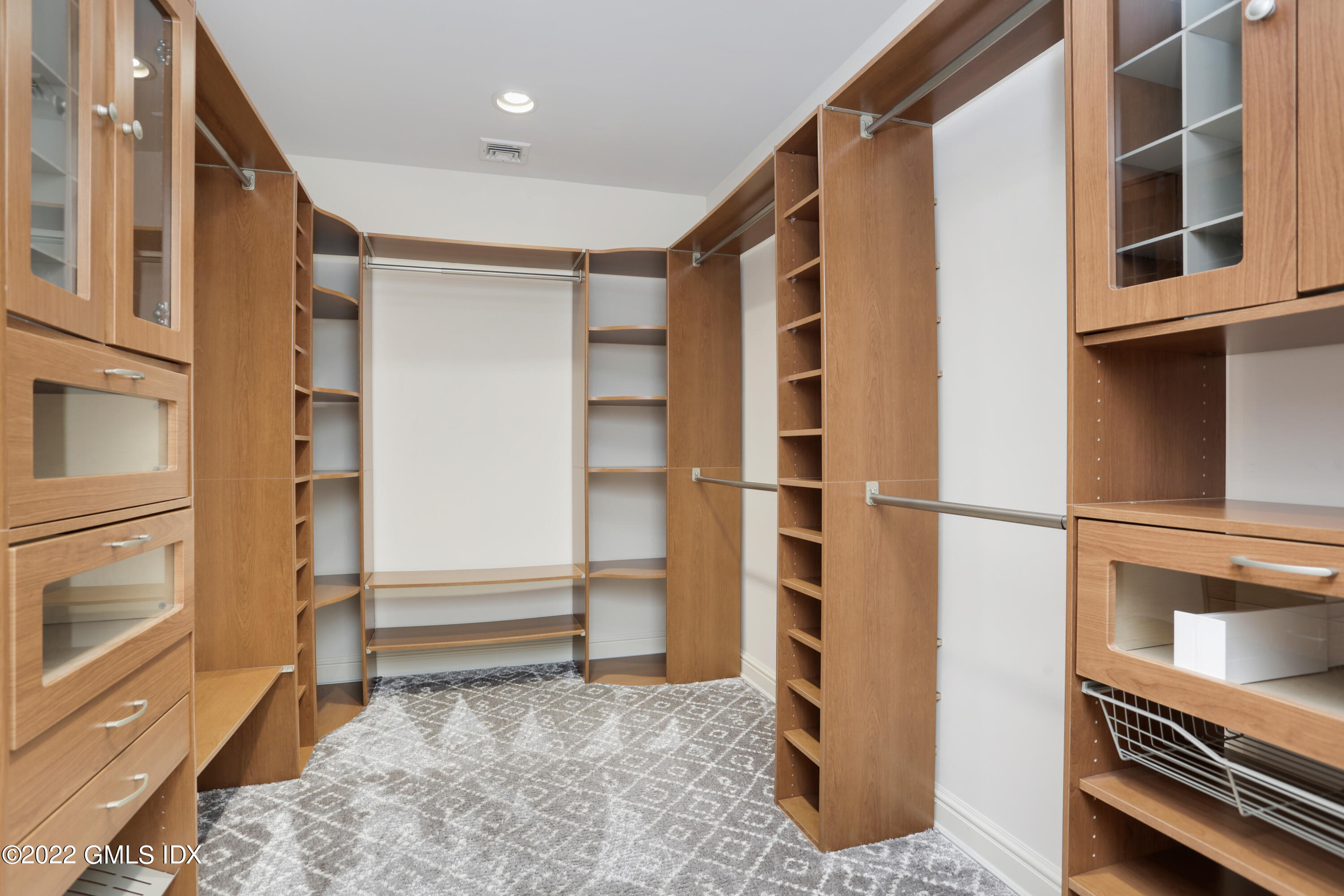 19 West Hill Road Stamford, CT 06902 - Photo 17 of 25 a view of walk in closet with empty racks