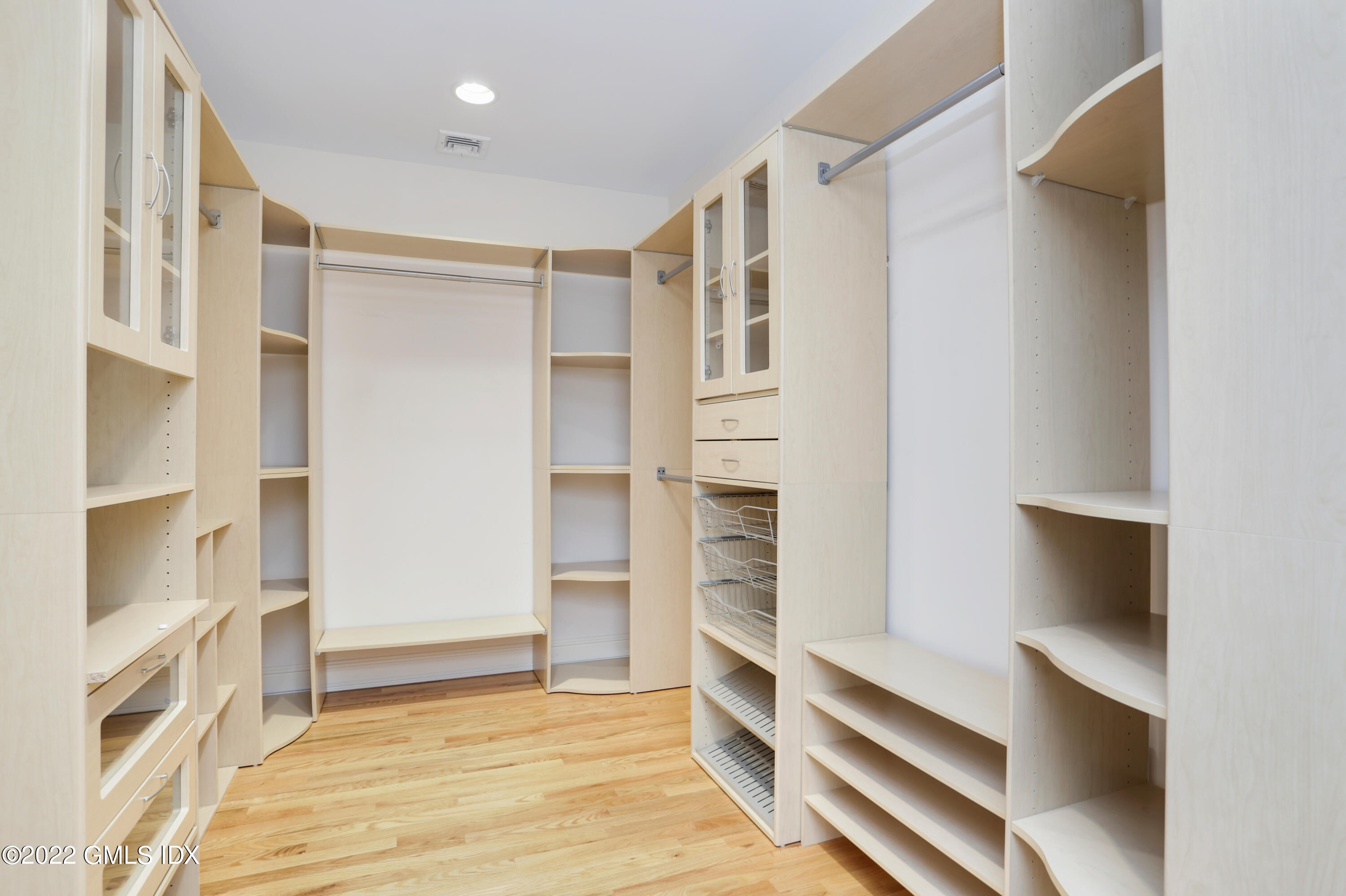19 West Hill Road Stamford, CT 06902 - Photo 18 of 25 a view of walk in closet with empty racks