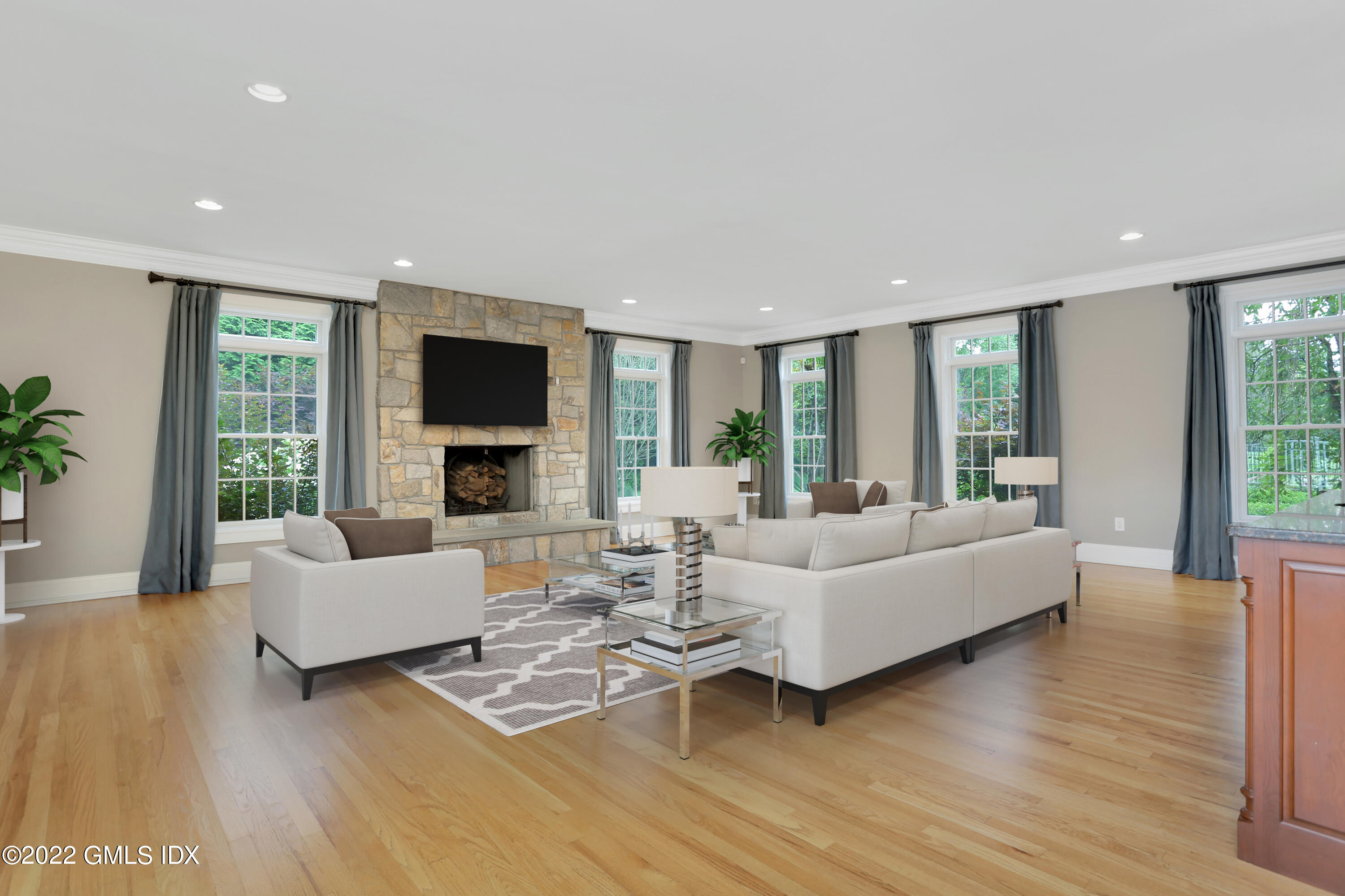 19 West Hill Road Stamford, CT 06902 - Photo 9 of 25 a living room with furniture and a fireplace