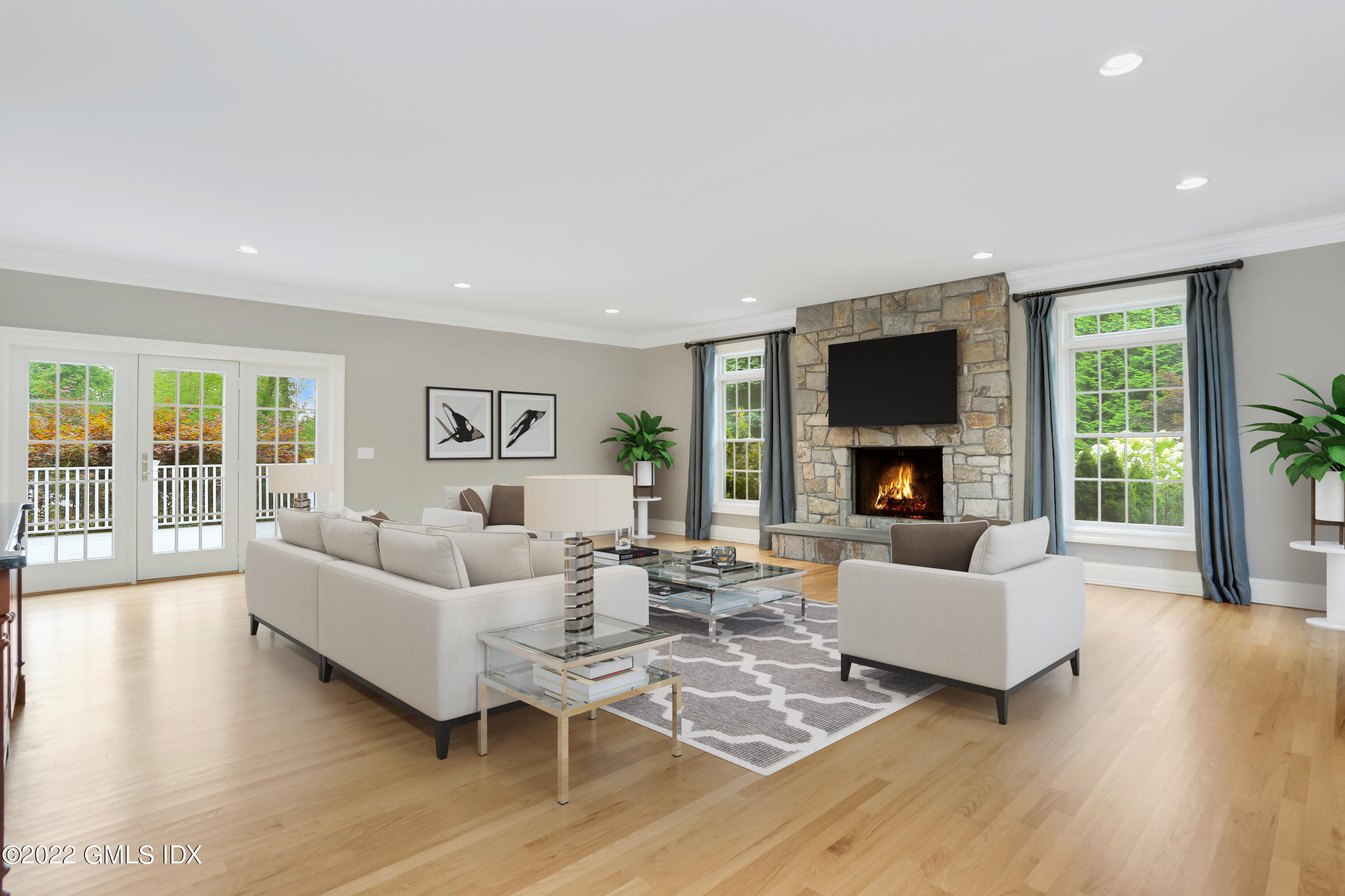 19 West Hill Road Stamford, CT 06902 - Photo 10 of 25 a living room with fireplace furniture and a large window