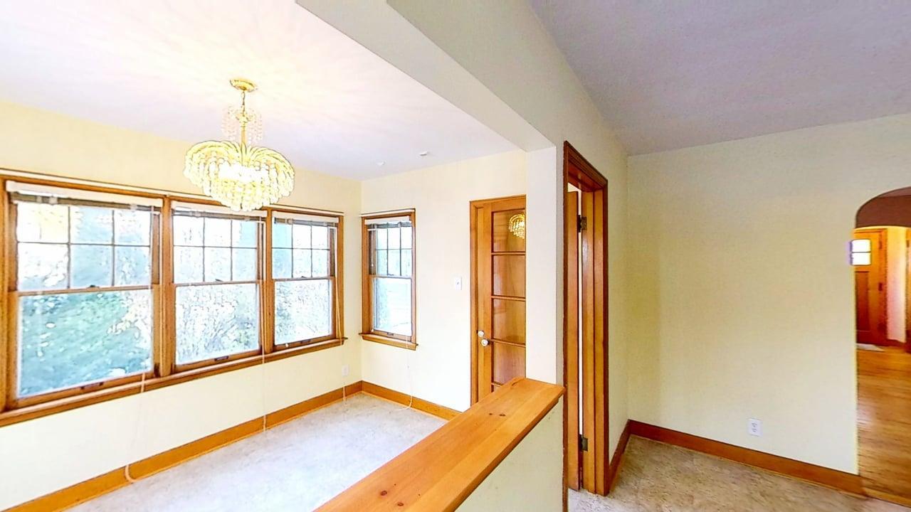 509 West Williams Street Kankakee, IL 60901 - Photo 11 of 26 a view of an empty room with a window