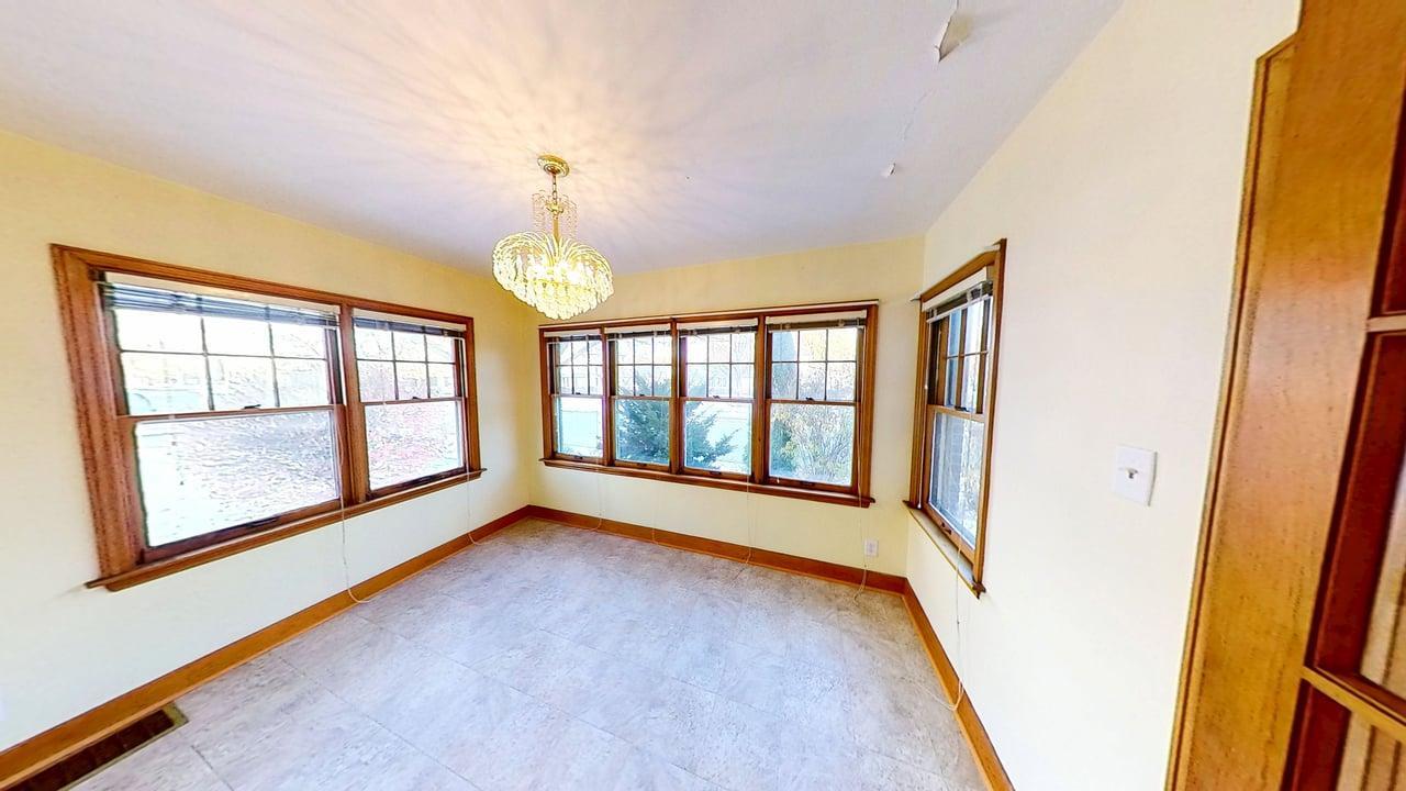 509 West Williams Street Kankakee, IL 60901 - Photo 12 of 26 a view of an empty room with a window