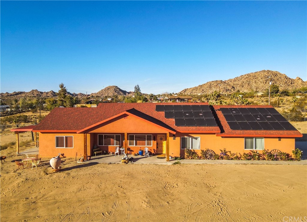 63664 Quail Springs Road Joshua Tree, CA 92252 - Photo 1 of 1 an aerial view of a house with a yard