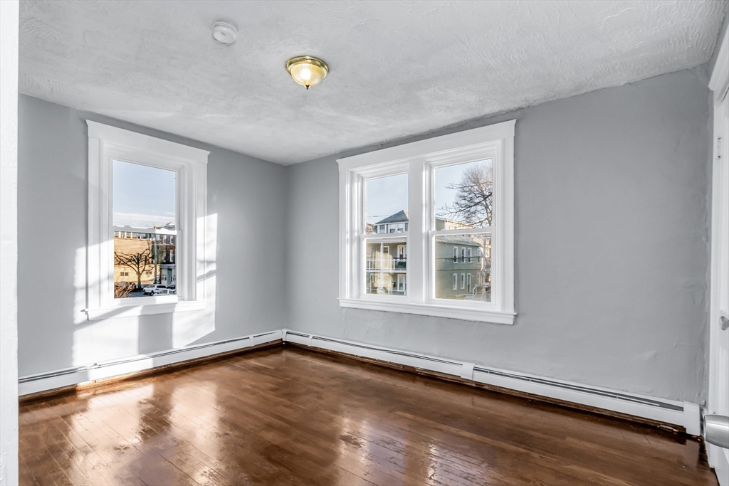 88 Congress Street, Unit 3 Salem, MA 01970 - Photo 18 of 31 an empty room with windows
