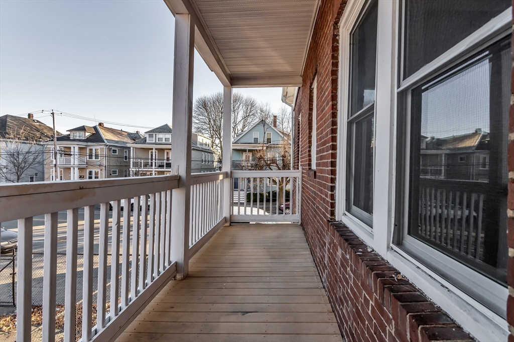 88 Congress Street, Unit 3 Salem, MA 01970 - Photo 23 of 31 a view of a balcony with wooden floor