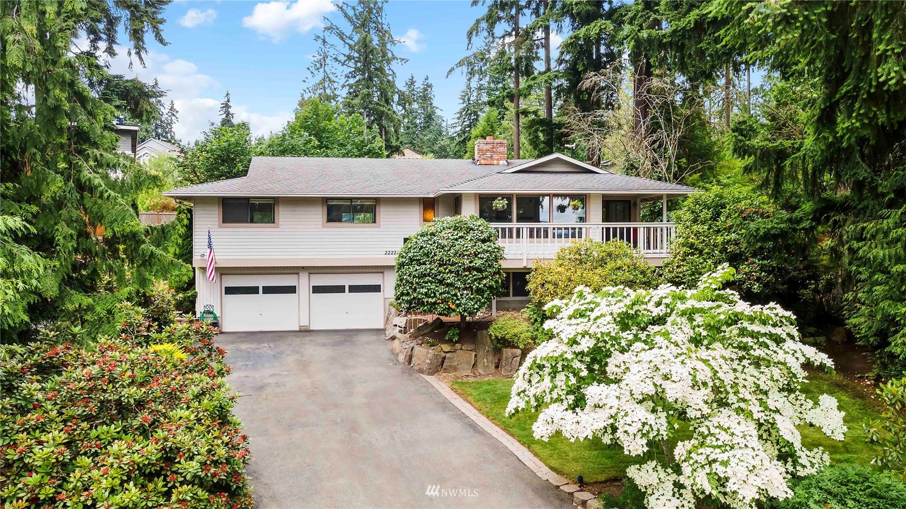 22224 3rd Avenue Southeast Bothell, WA 98021 - Photo 1 of 30 a front view of a house with a yard