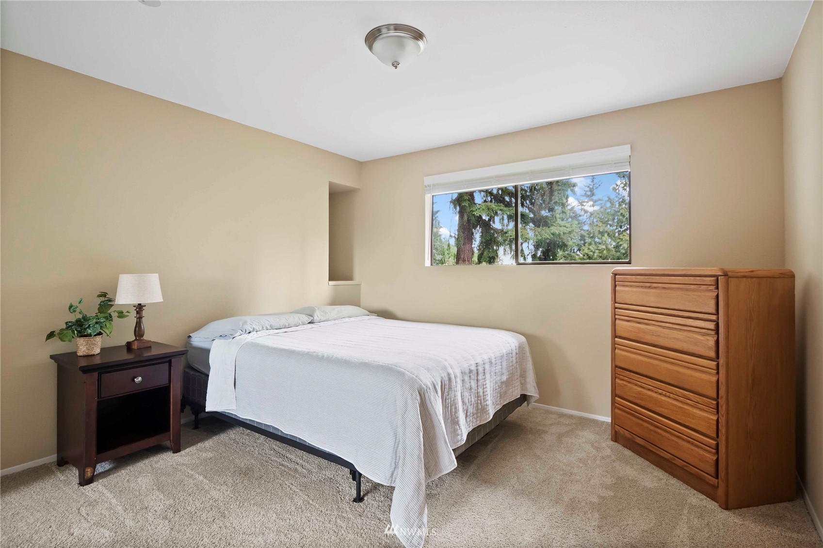 22224 3rd Avenue Southeast Bothell, WA 98021 - Photo 15 of 30 a bedroom with a bed and a window