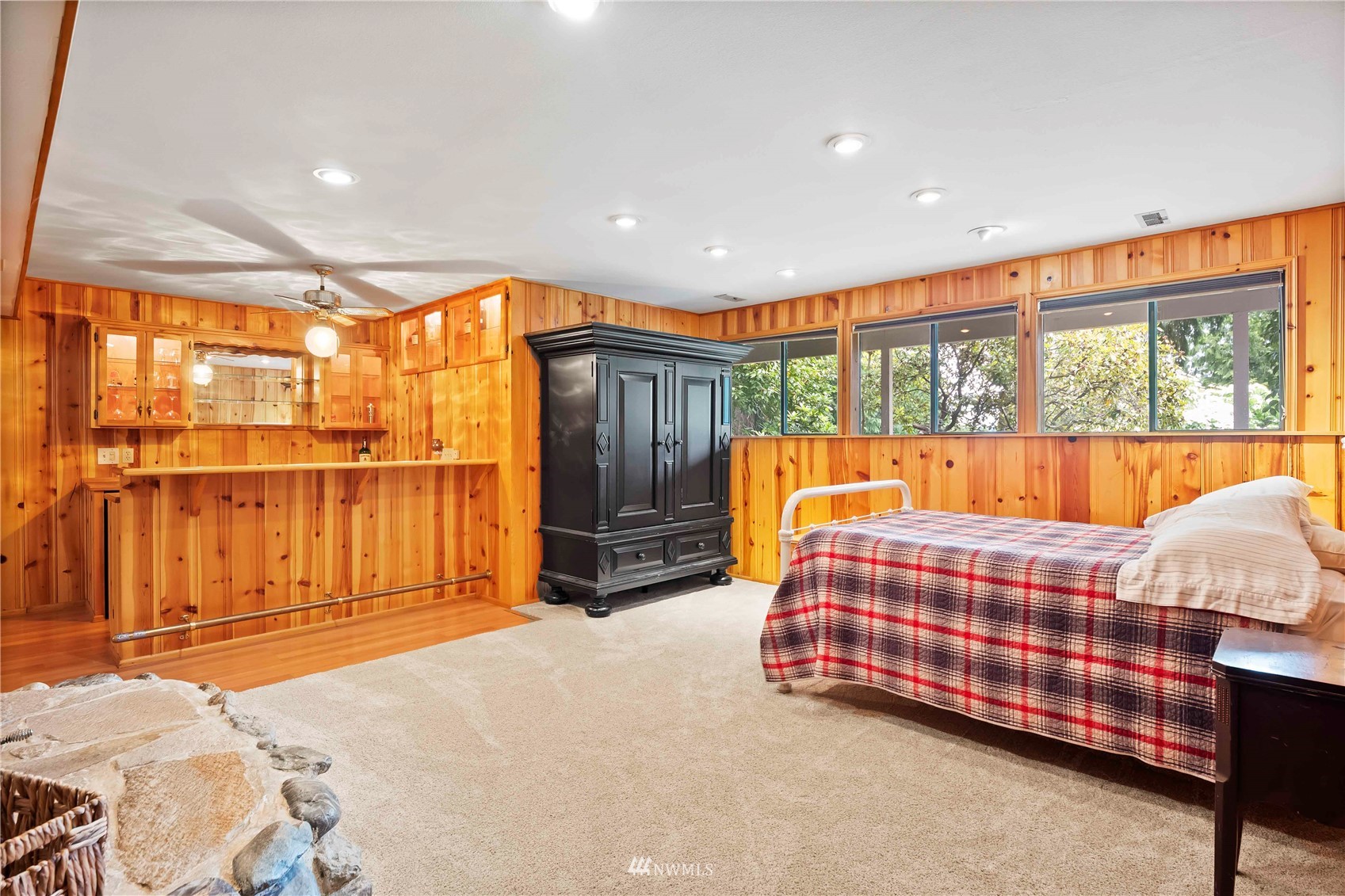 22224 3rd Avenue Southeast Bothell, WA 98021 - Photo 19 of 30 a bedroom with a bed and large window