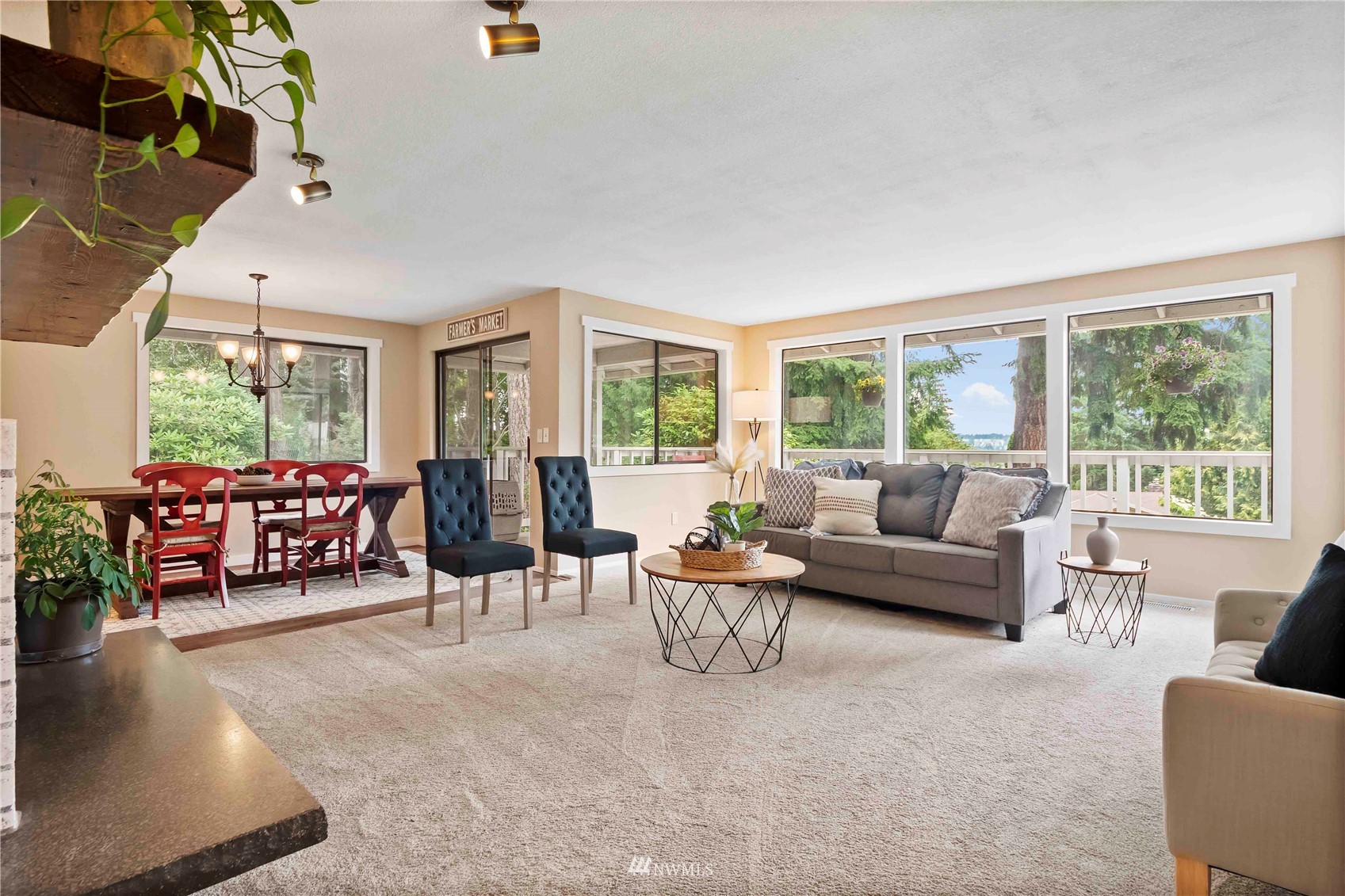 22224 3rd Avenue Southeast Bothell, WA 98021 - Photo 2 of 30 a living room with furniture and a large window