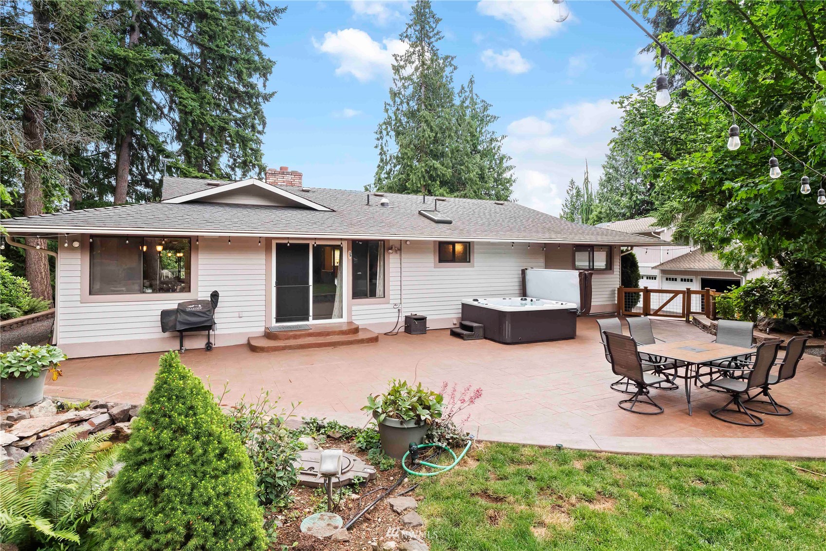 22224 3rd Avenue Southeast Bothell, WA 98021 - Photo 27 of 30 a view of a house with sitting area and garden