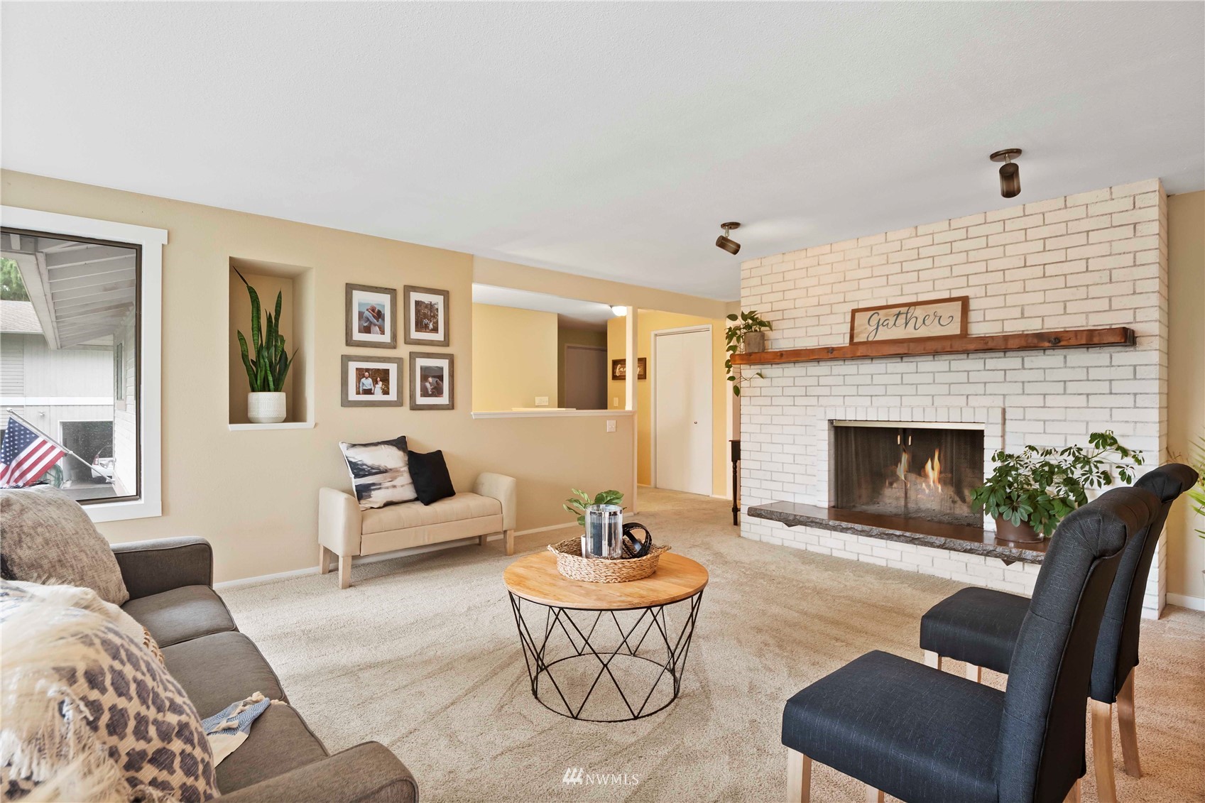 22224 3rd Avenue Southeast Bothell, WA 98021 - Photo 3 of 30 a living room with furniture and a fireplace