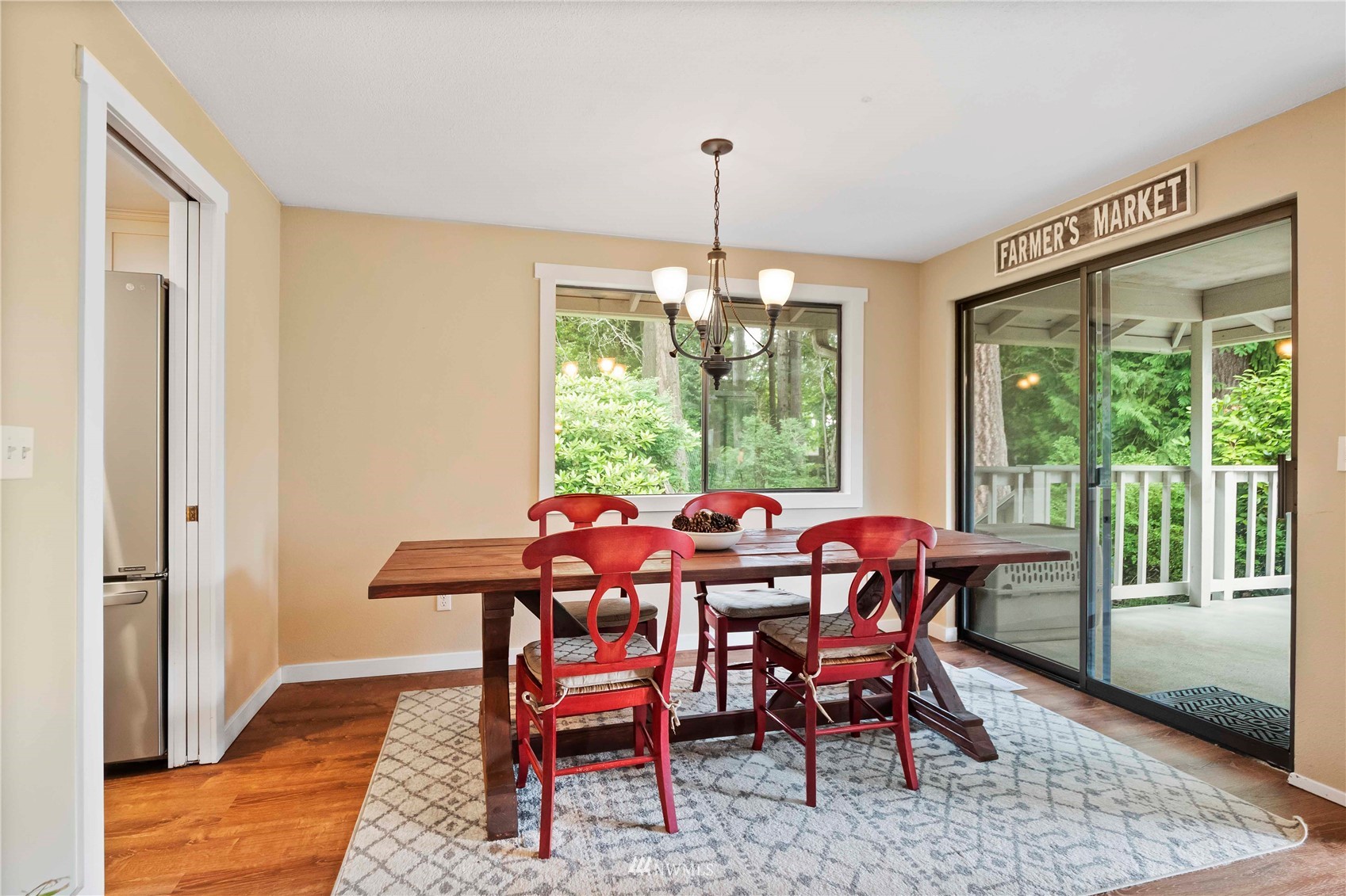 22224 3rd Avenue Southeast Bothell, WA 98021 - Photo 7 of 30 a view of a dining room with furniture window and wooden floor