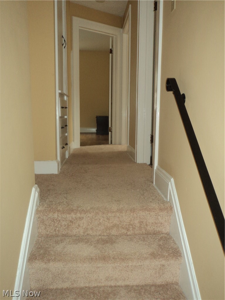 1474 Larchmont Road Cleveland, OH 44110 - Photo 9 of 27 Entering the upstairs to three bedrooms and one full bath...hallway has built in drawers and cabinet for your linens.
