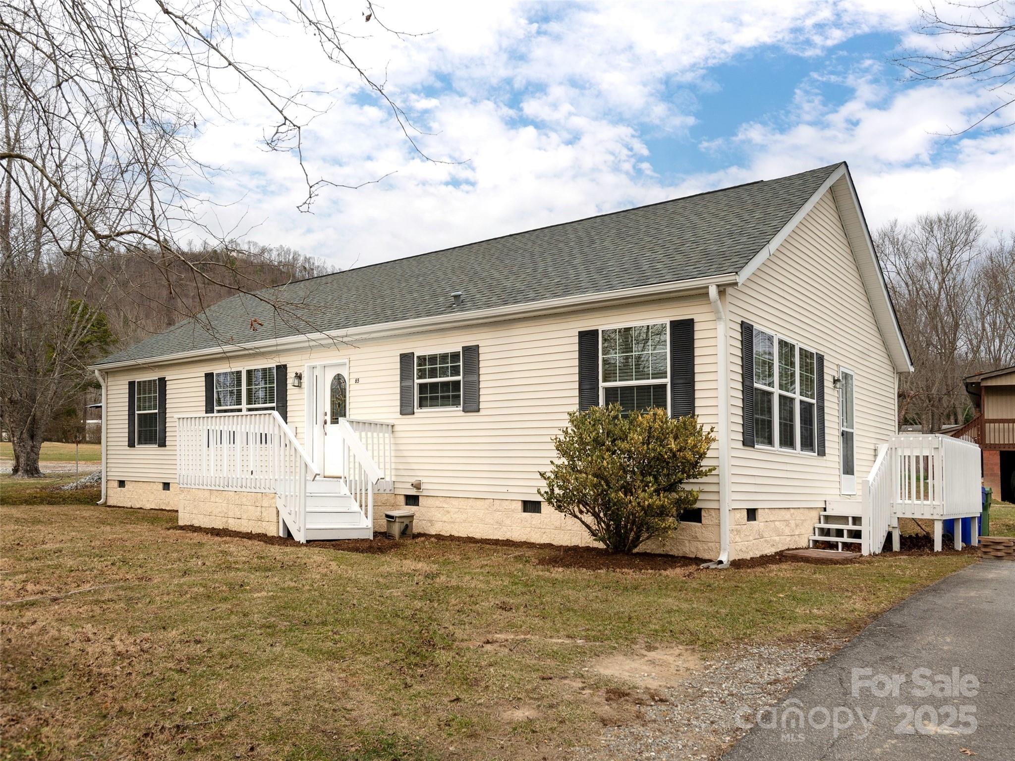 65 Philips Court Fletcher, NC 28732 - Photo 1 of 18 a front view of house with yard