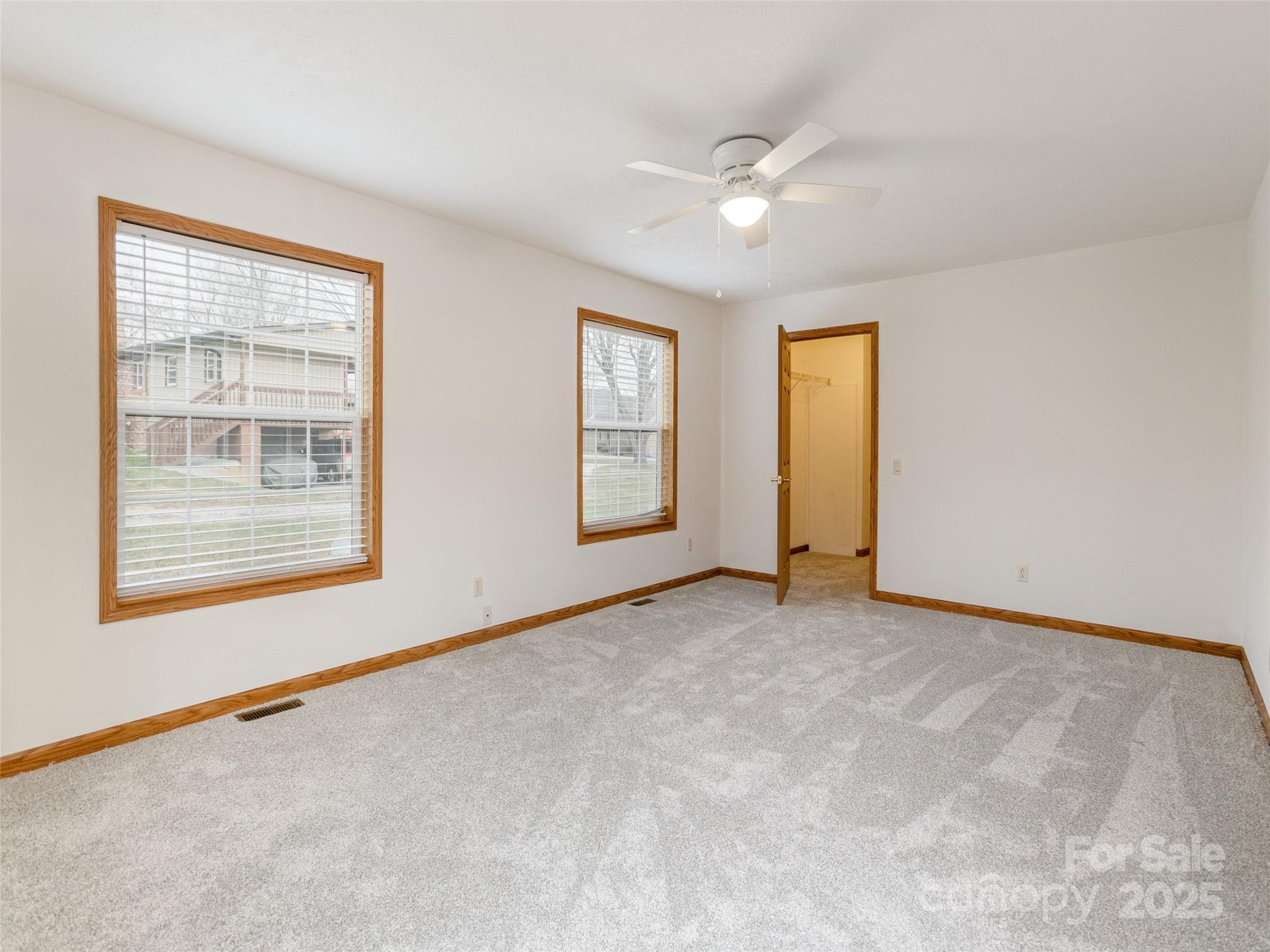 65 Philips Court Fletcher, NC 28732 - Photo 10 of 18 an empty room with windows and closet