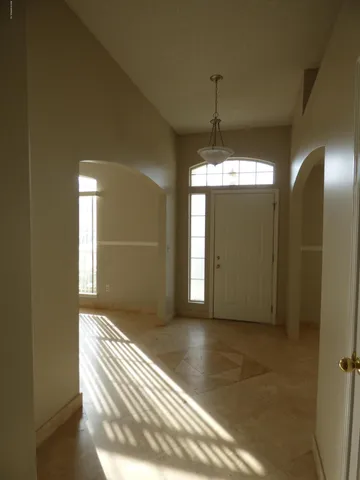 a view of a room with a chandelier